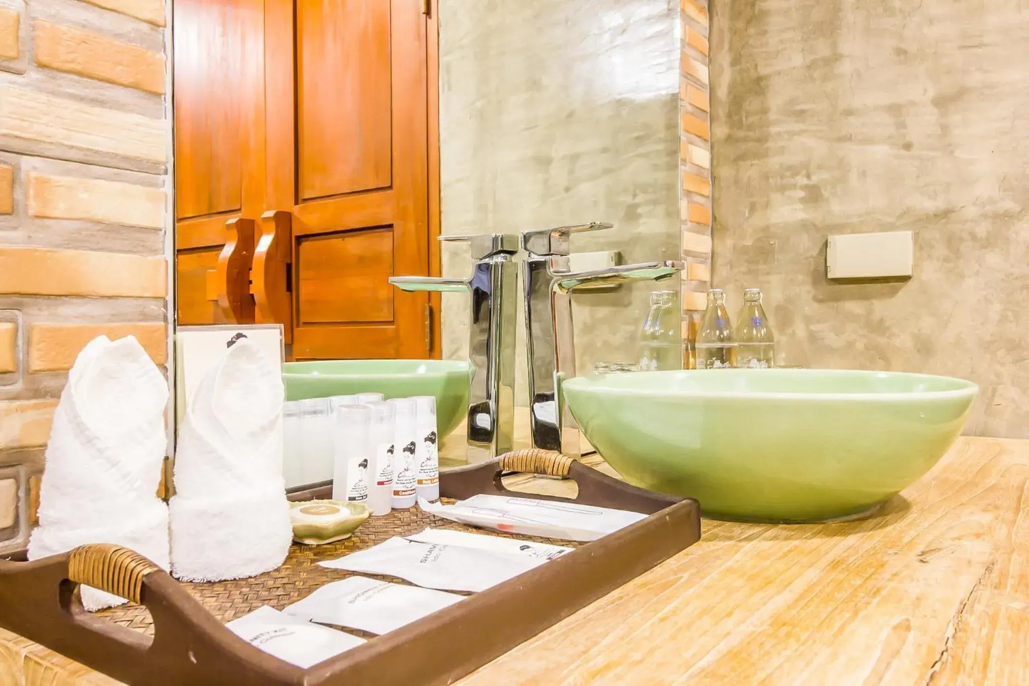 Bathroom in The Chaya Resort and Spa