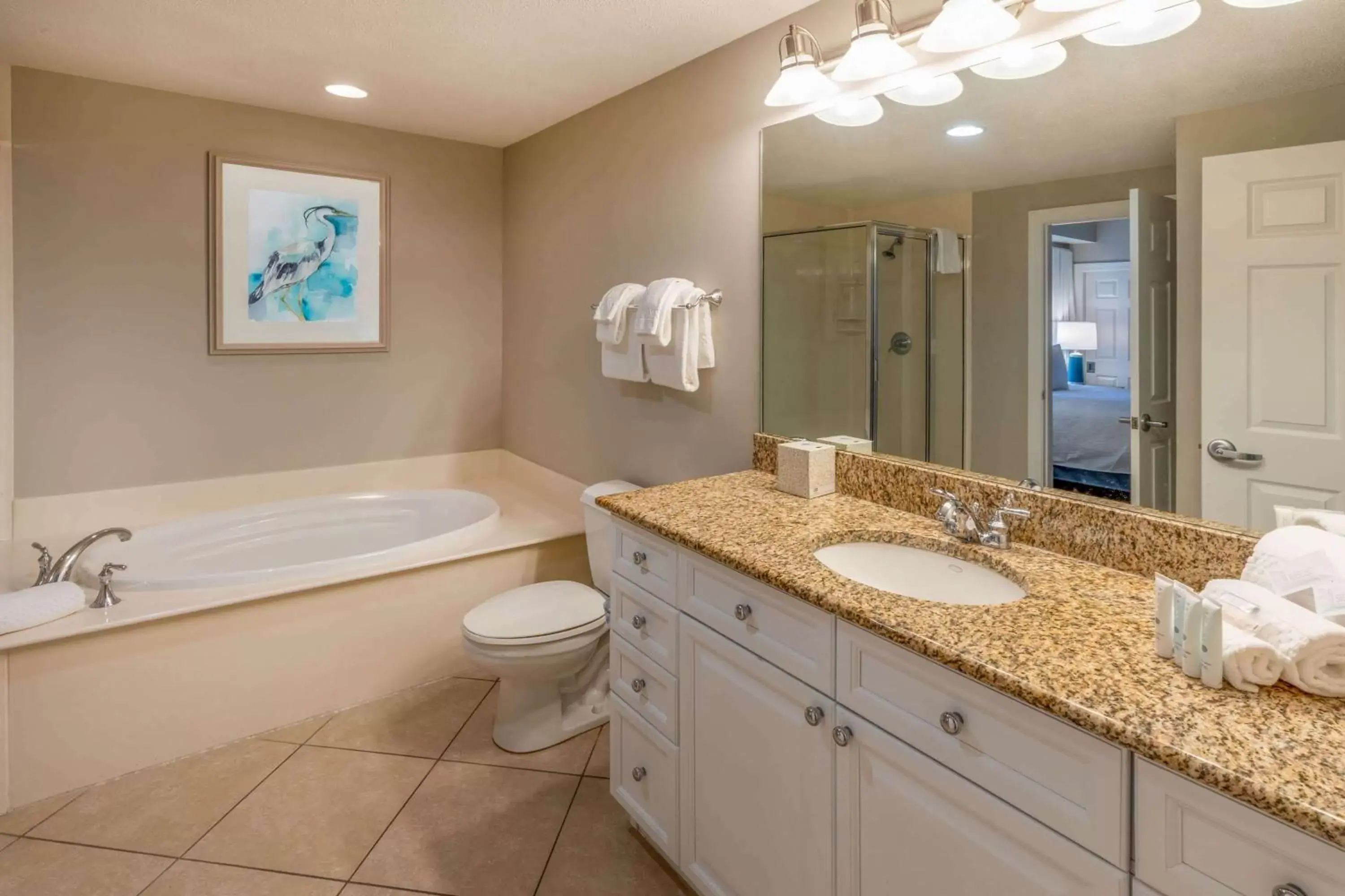 TV and multimedia, Bathroom in Escapes! To The Shores Orange Beach, A Ramada by Wyndham