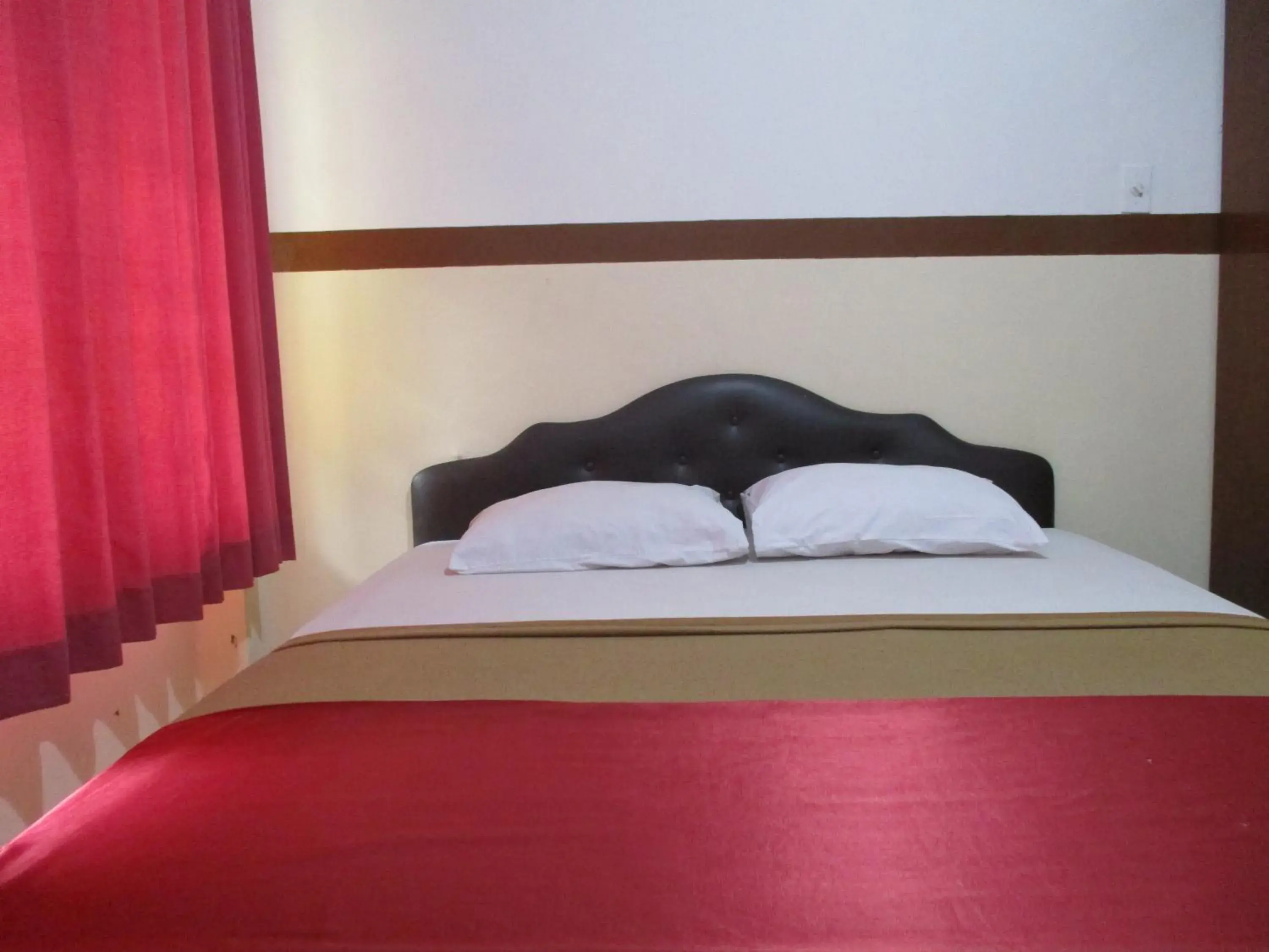 Bed in Hotel Tugu Asri