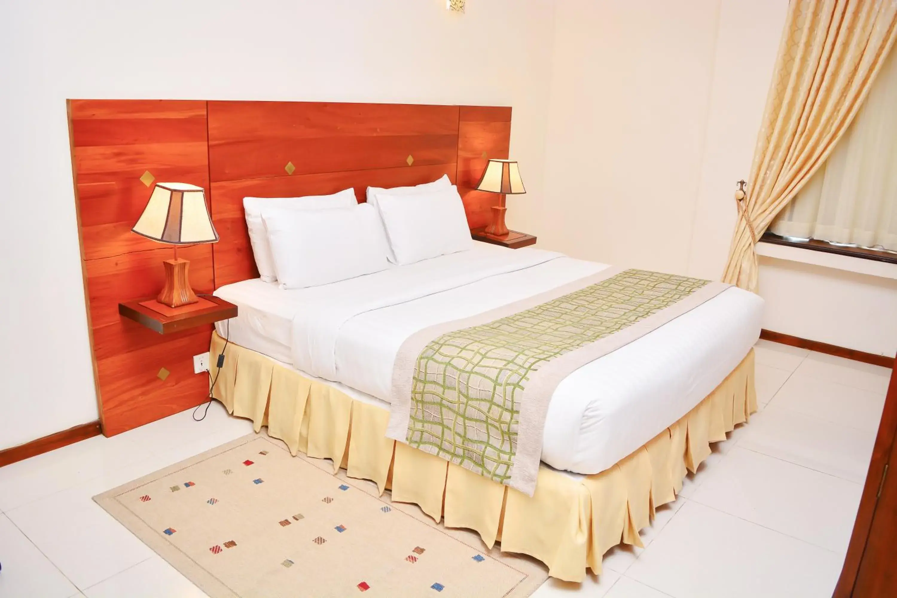 Bed, Room Photo in Unique Towers Luxury Boutique Suites