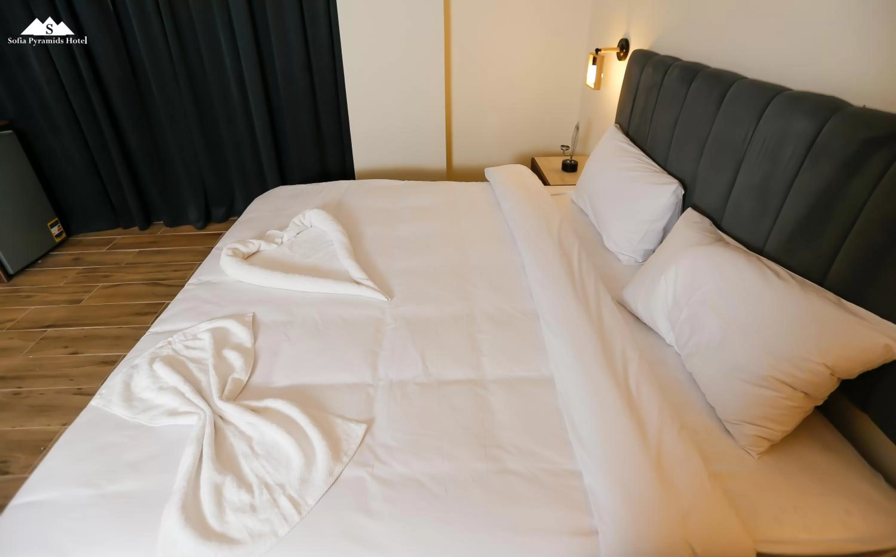 Bed in Sofia Pyramids Hotel