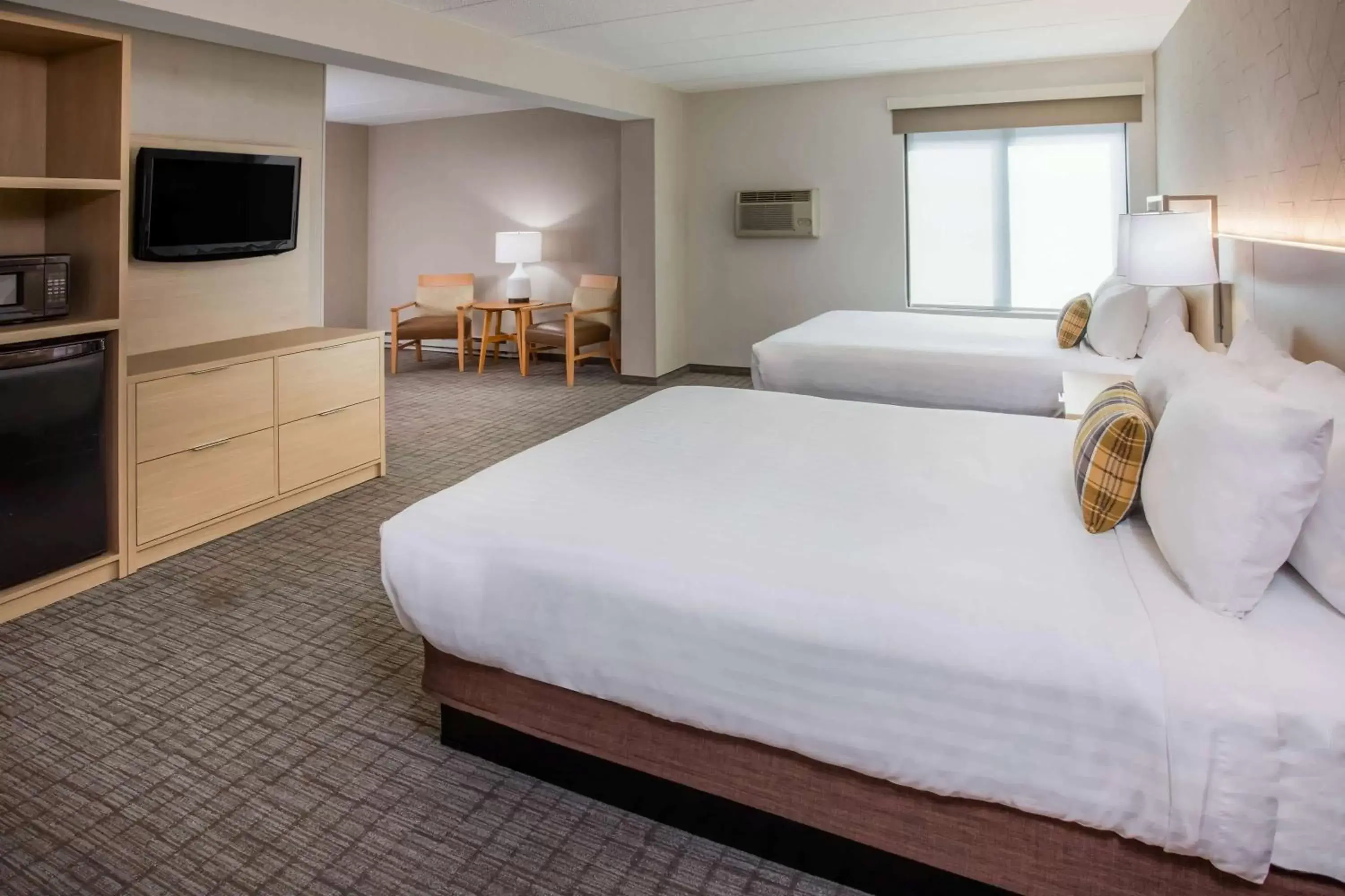 Photo of the whole room, Bed in Days Inn & Suites by Wyndham Duluth by the Mall