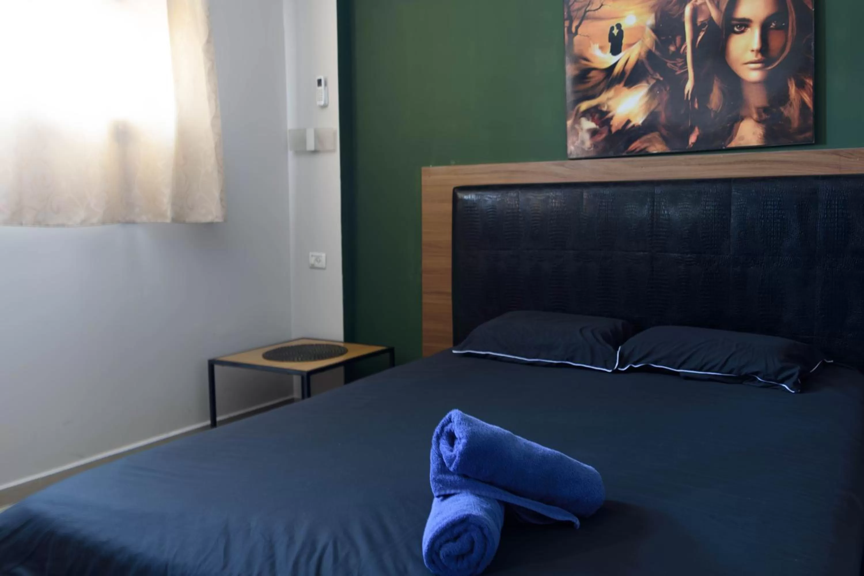 Bed in Central Laguardia Hotel