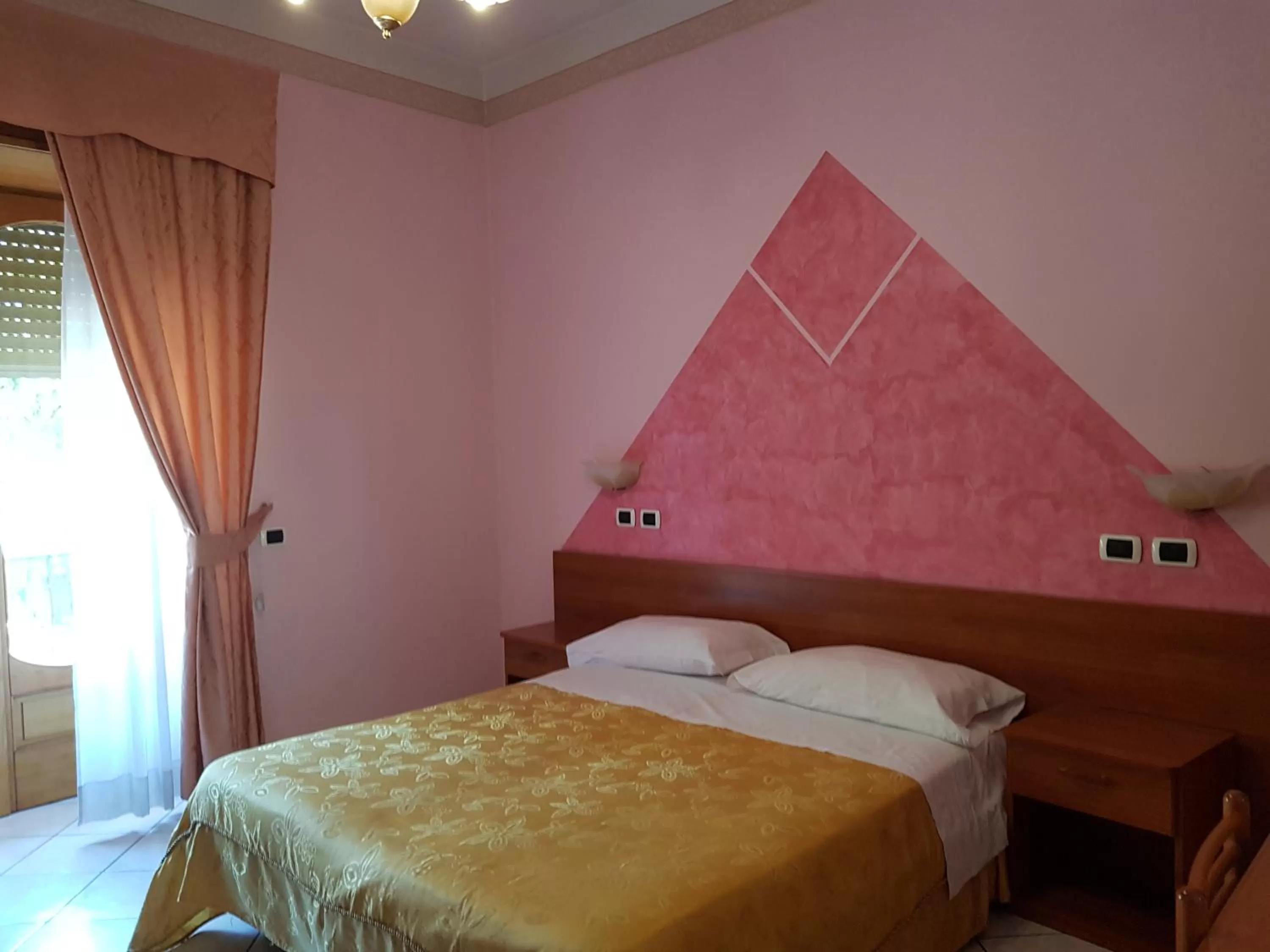 Bed in Hotel Gentile