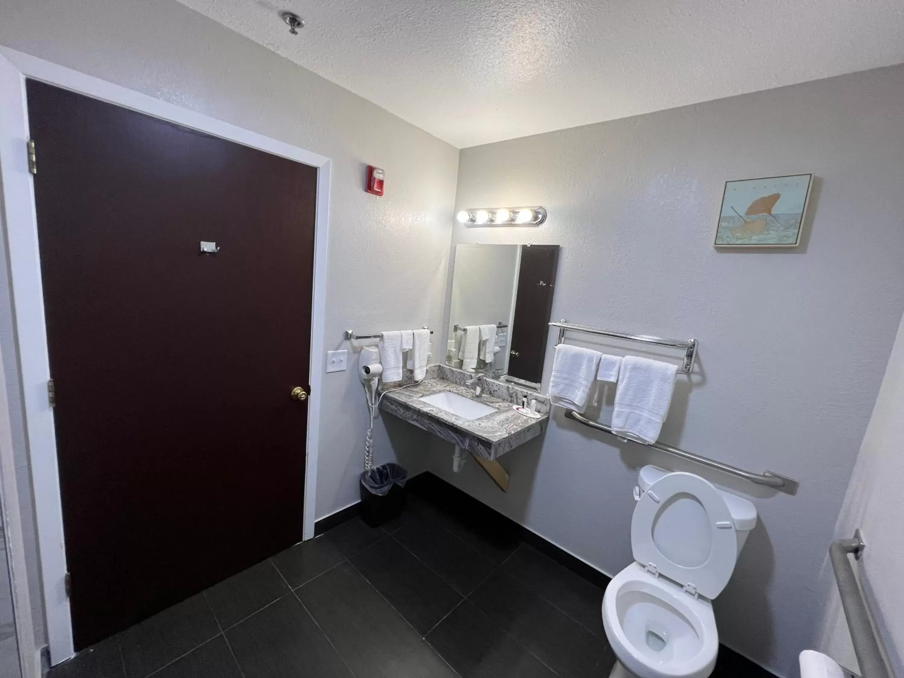 Bathroom in Super 8 by Wyndham Lake Charles/Sulphur