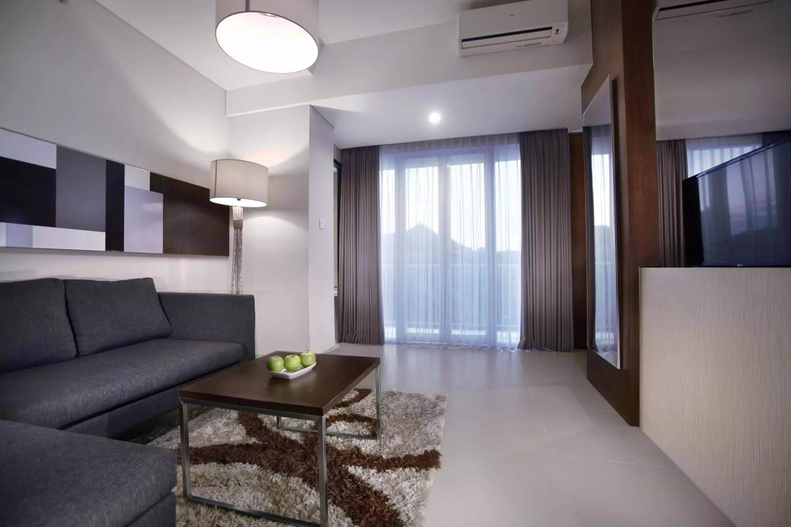 Living room, Seating Area in Neo Denpasar by ASTON