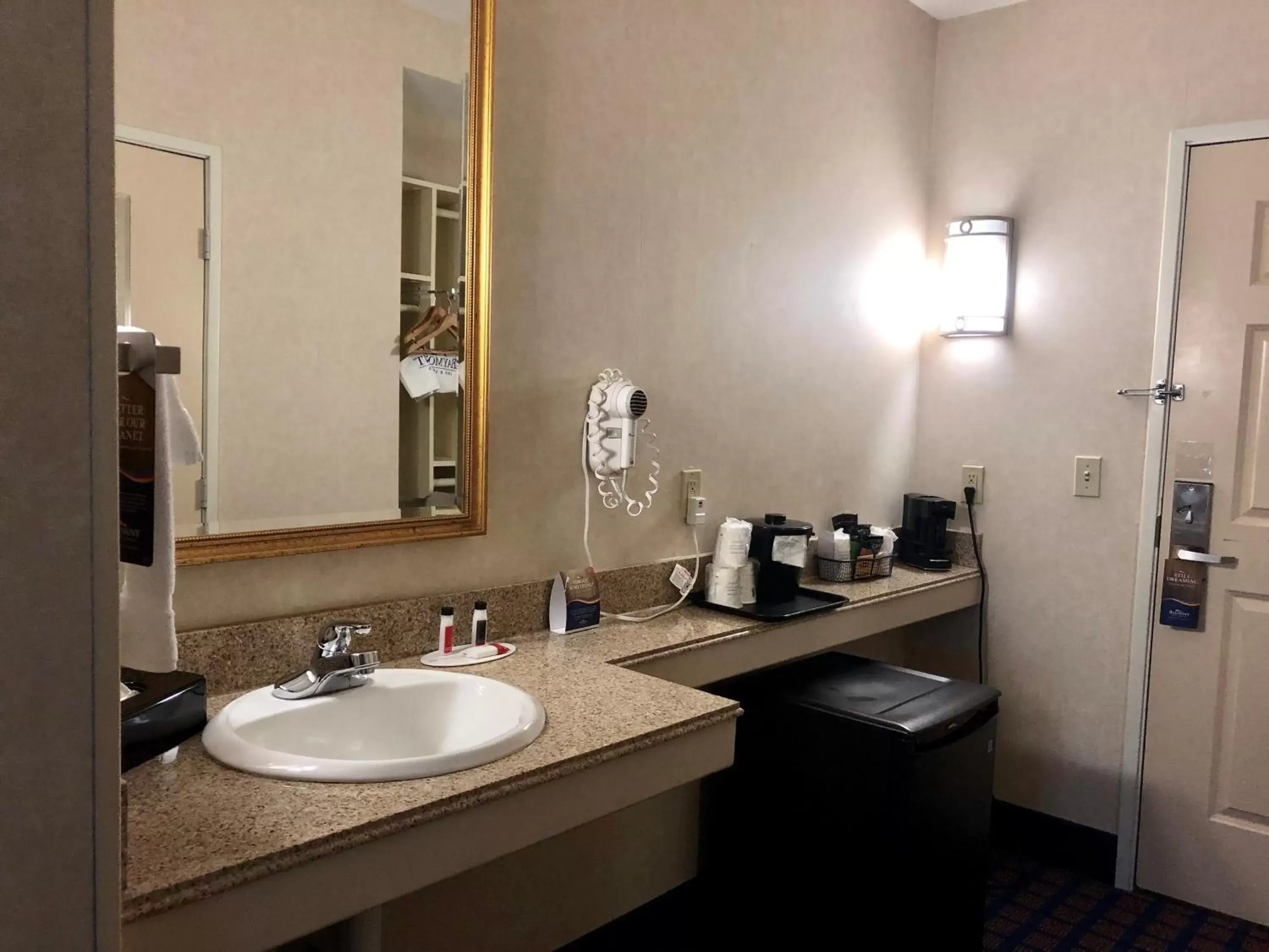 Bathroom in Baymont by Wyndham Grand Rapids SW/Byron Center