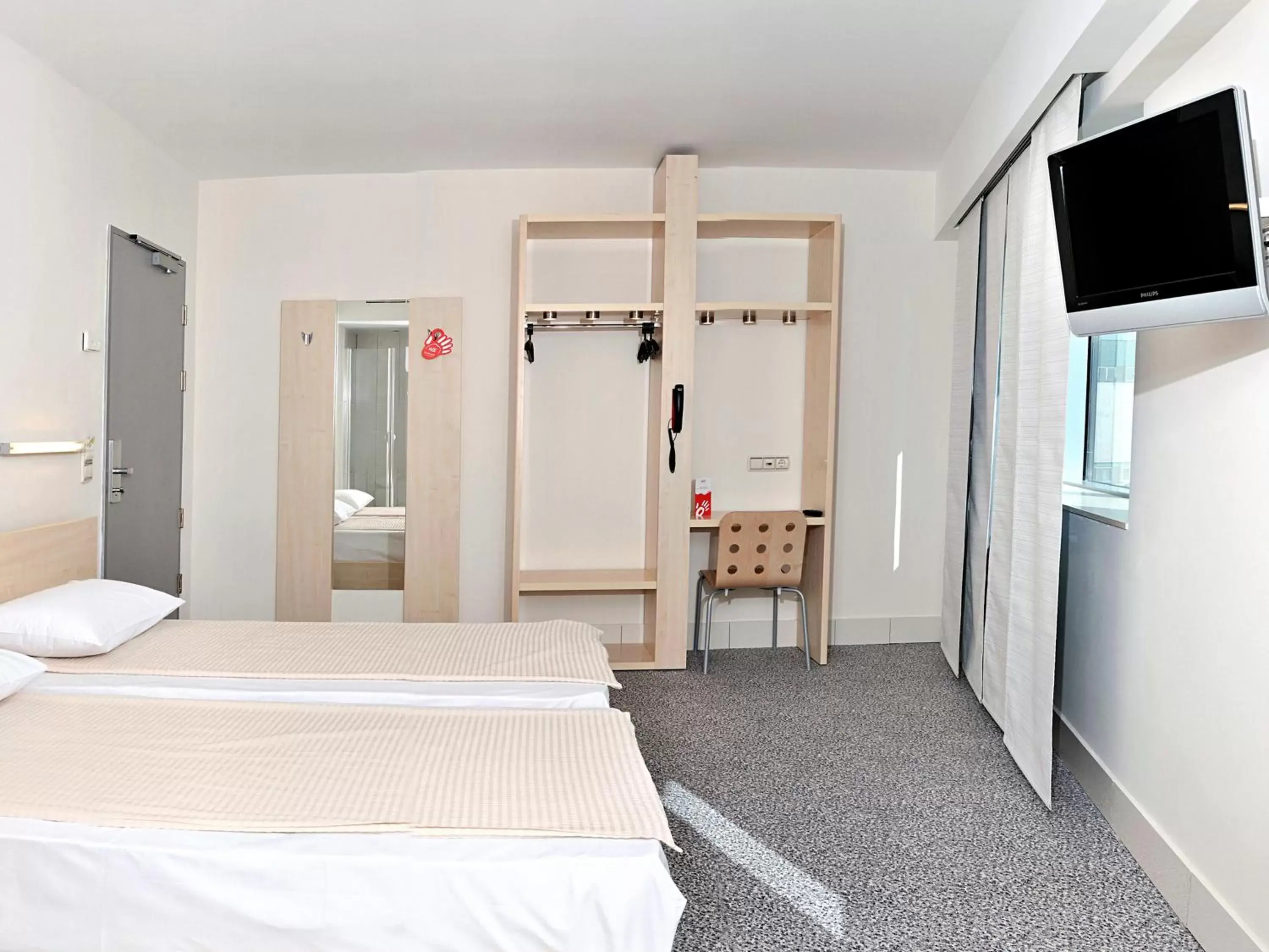 Photo of the whole room, Bed in Hello Hotels Gara de Nord