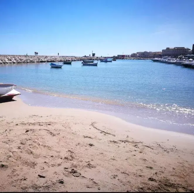 Beach in Gli specchi di Archimede