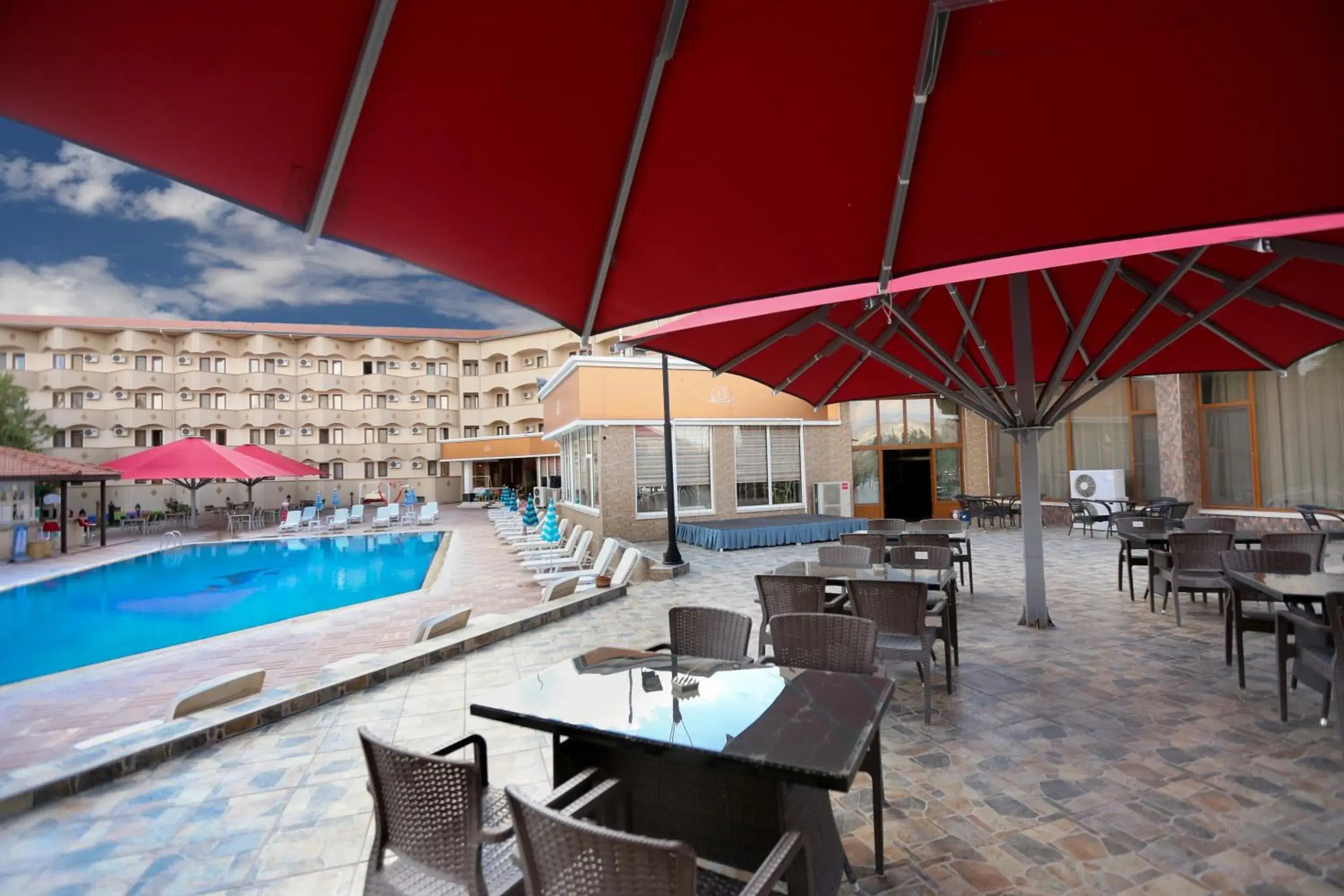 Balcony/Terrace, Swimming Pool in SIGNATURE GARDEN AVANOS Hotel & SPA