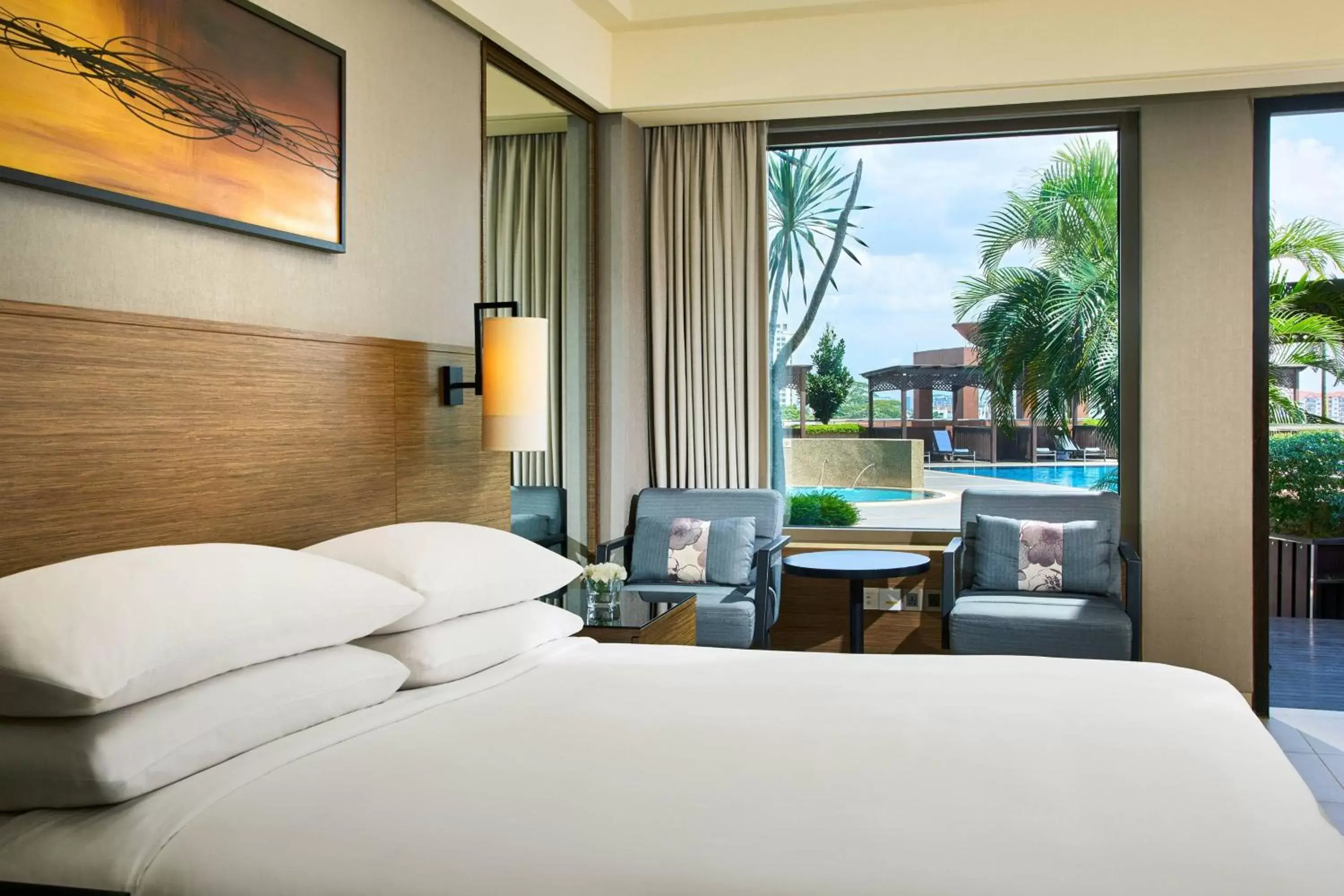 Swimming pool, Bed in Renaissance Johor Bahru Hotel