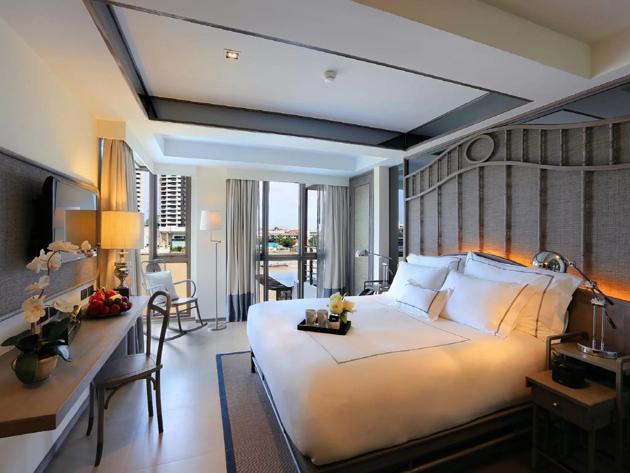 Photo of the whole room, Bed in Riva Surya Bangkok