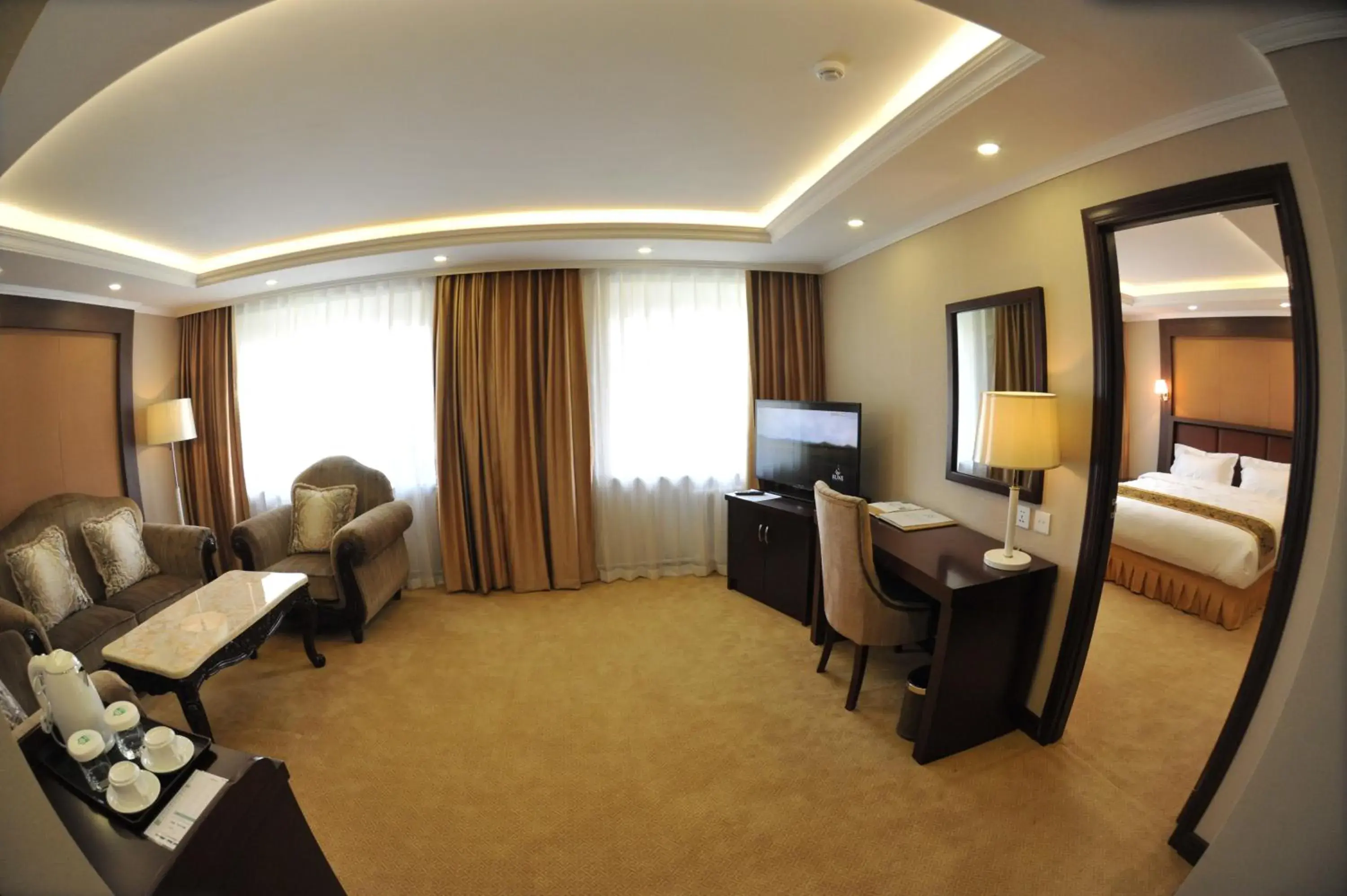 Bed, TV/Entertainment Center in Flower Hotel