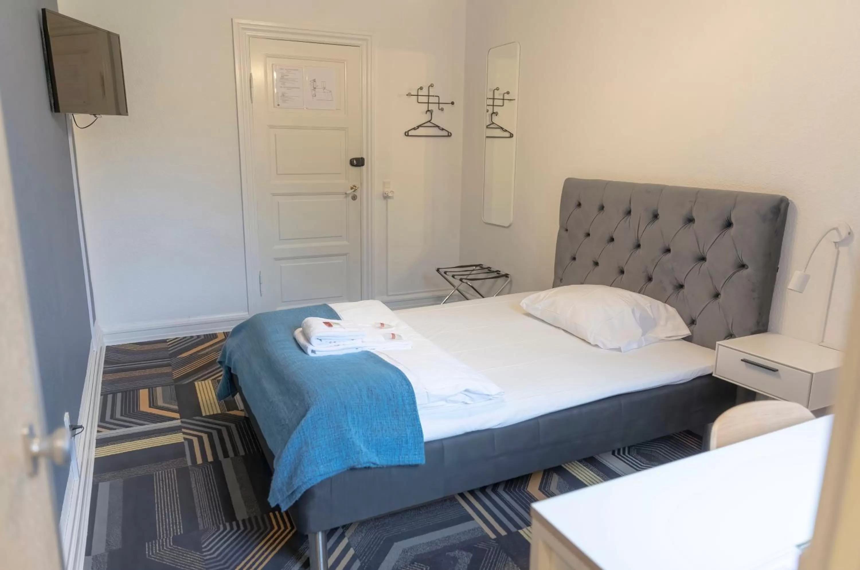 Bed in Hotel Harmonien