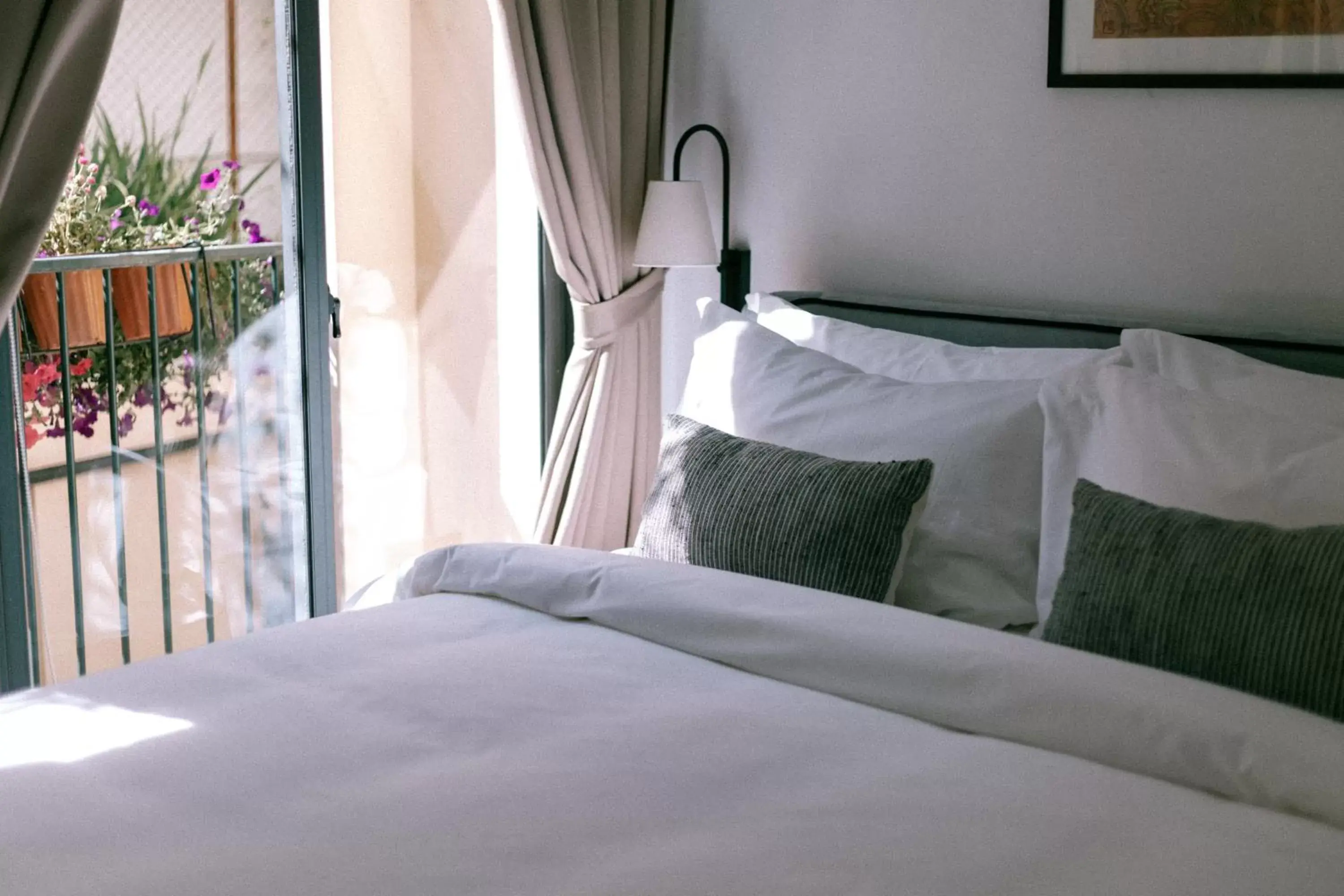 Bed in La Chronique Hotel Bed in La Chronique Hotel