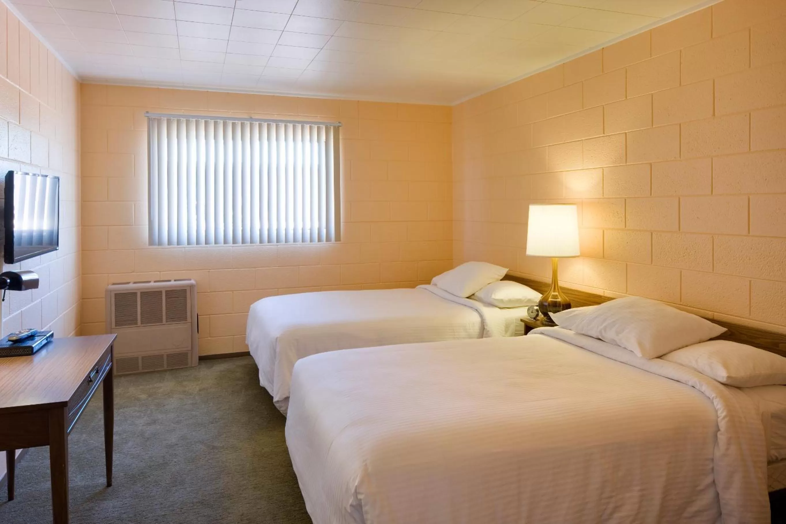 Bed in Sunset Motel Moriarty