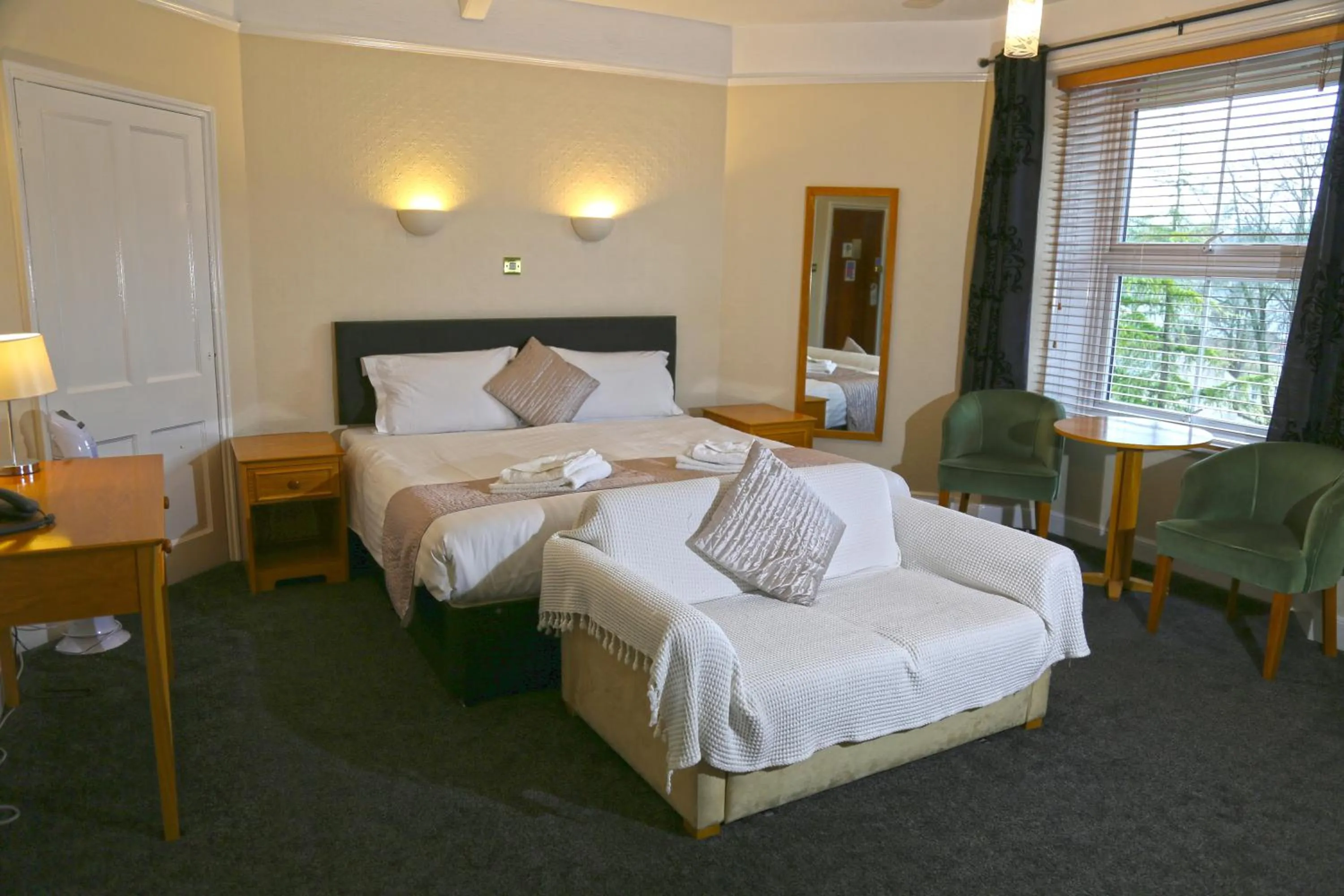 Bed in Westberry Hotel