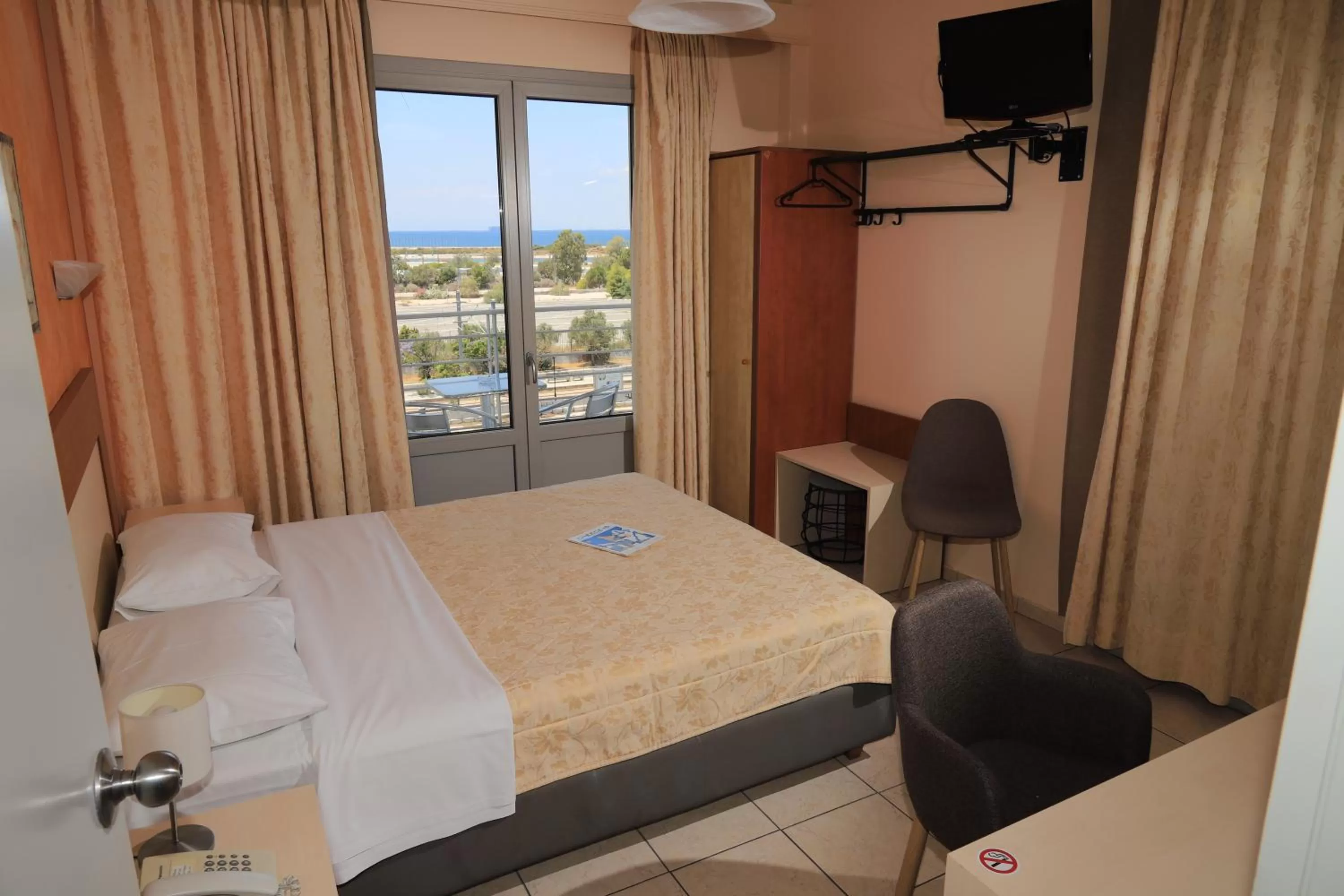 Bed in IKAROS Hotel ELLINIKO