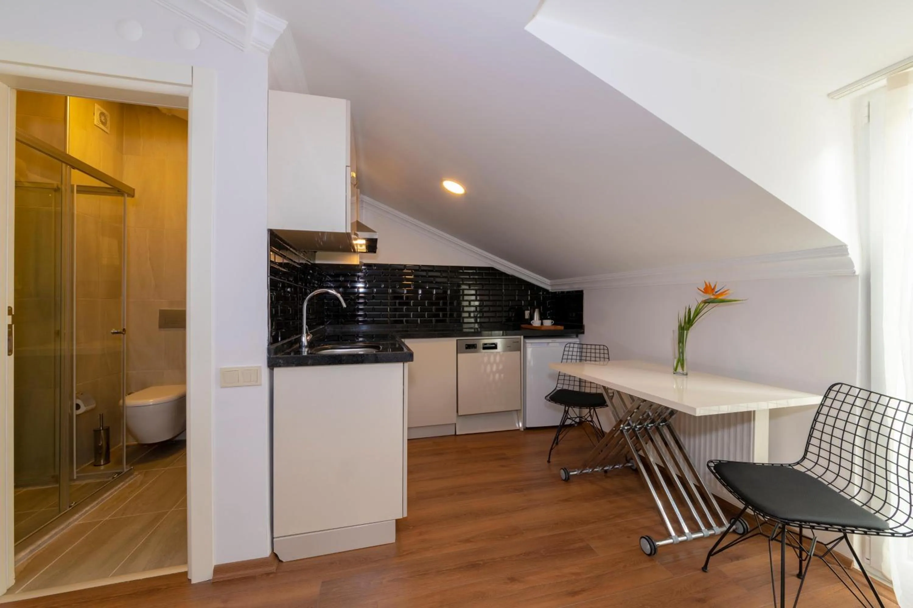 Kitchen or kitchenette in Joy Suites