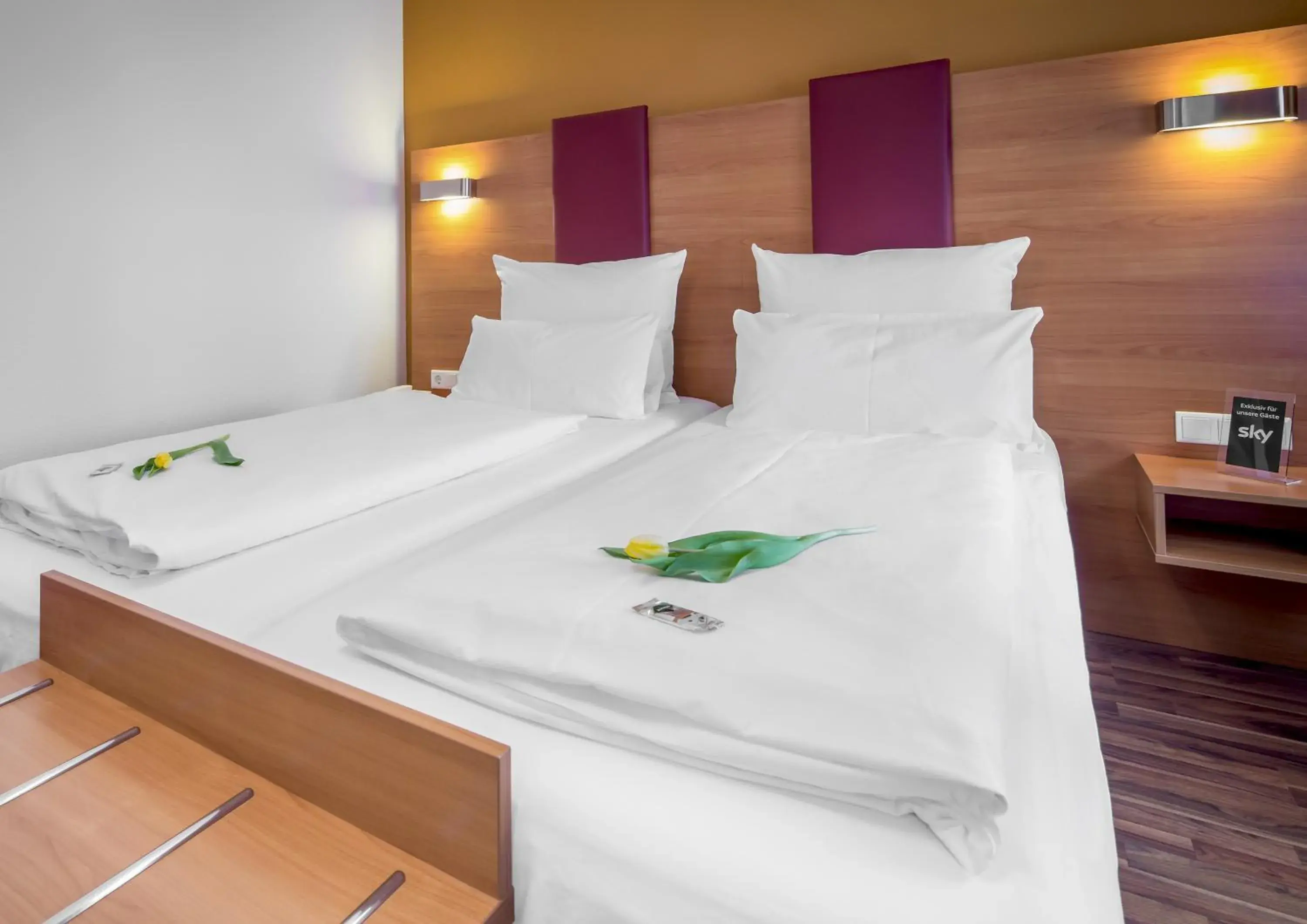 Bed in TIPTOP Hotel Burgschmiet Garni Bed in TIPTOP Hotel Burgschmiet Garni