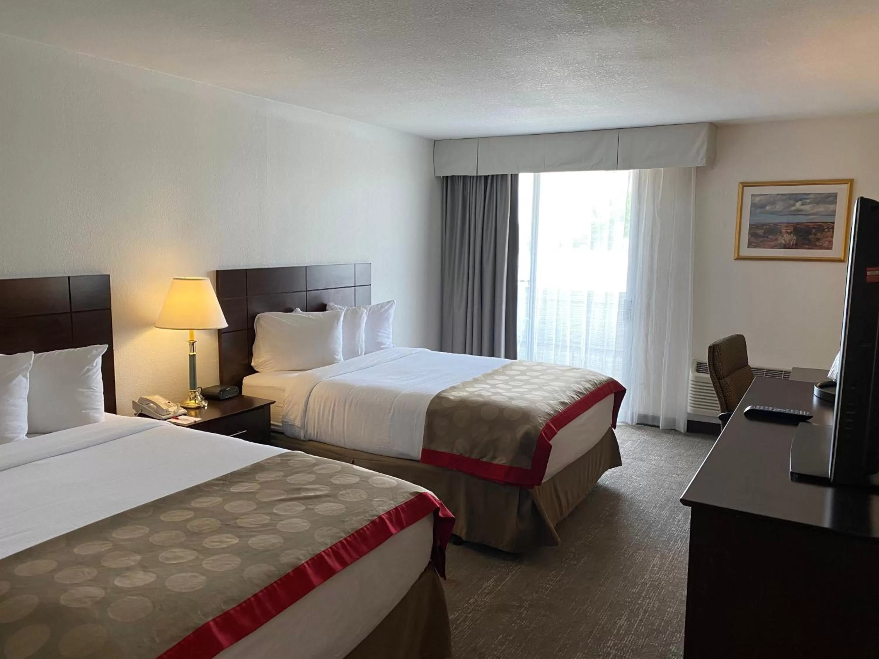 Bed in Ramada by Wyndham Albuquerque Midtown
