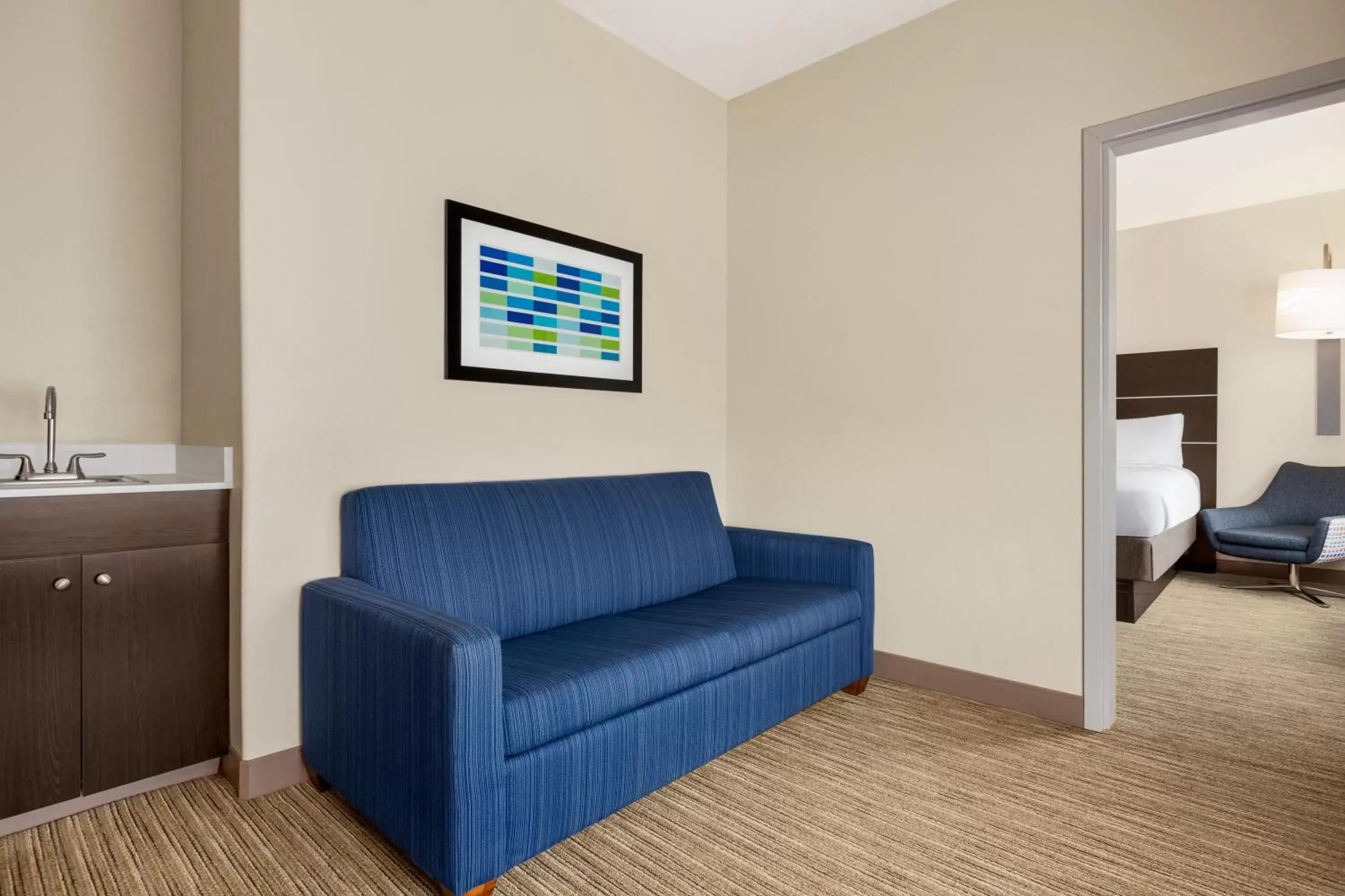 Bed, Seating Area in Holiday Inn Express Hotel & Suites San Antonio NW-Medical Area, an IHG Hotel