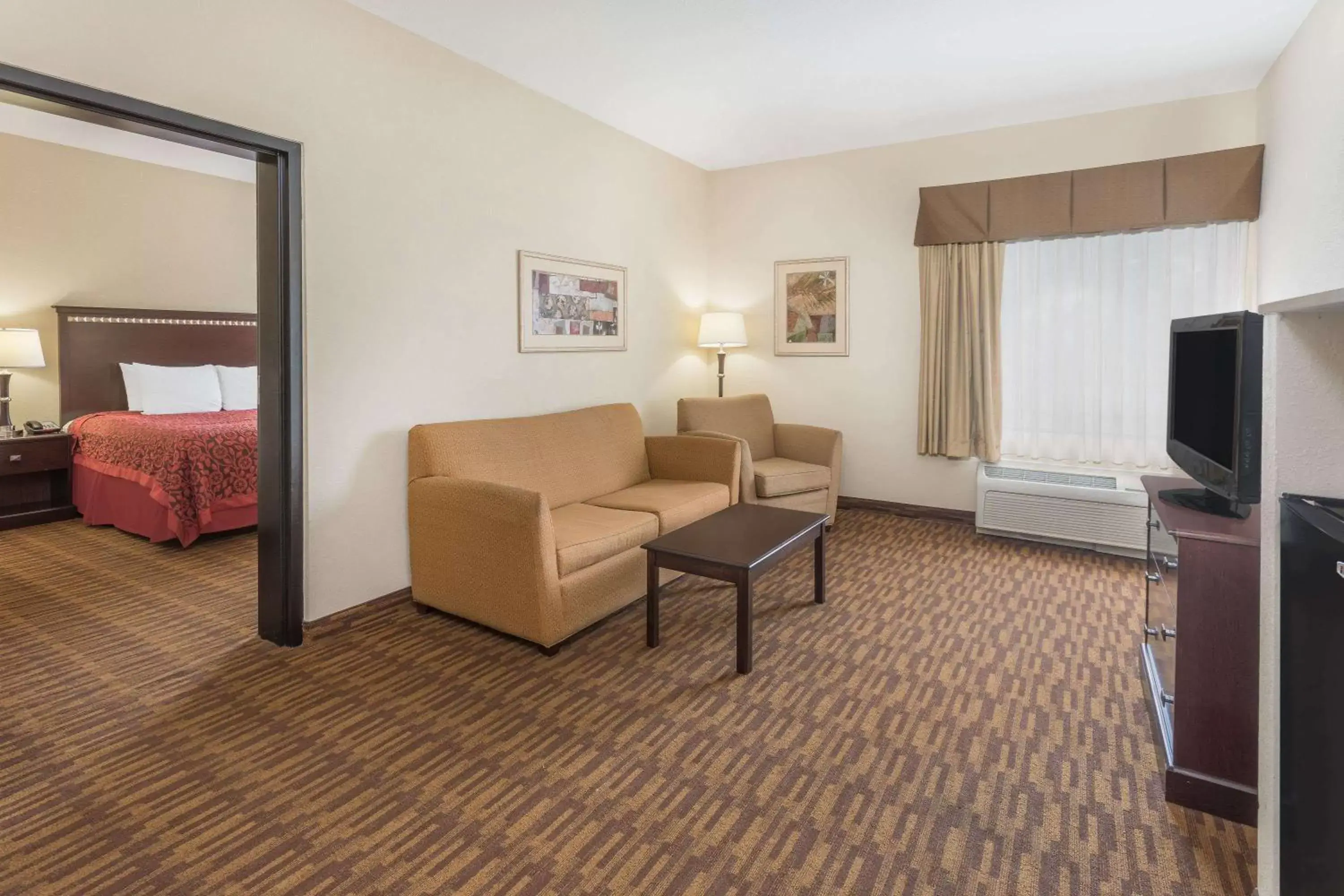 Photo of the whole room, Seating Area in Days Inn by Wyndham Semmes Mobile