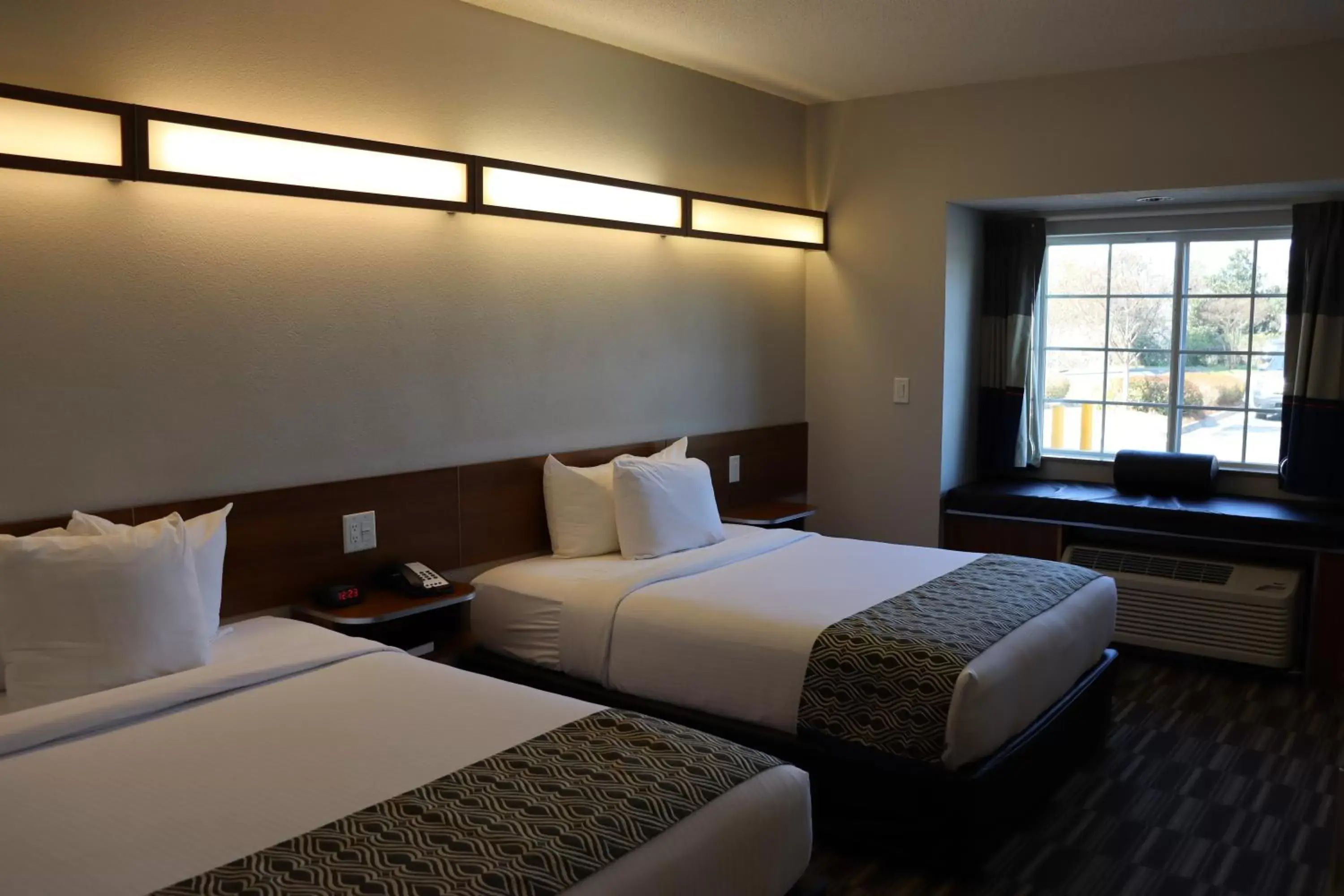 Bedroom, Bed in Microtel Inn & Suites by Wyndham Columbus Near Fort Moore Bedroom, Bed in Microtel Inn & Suites by Wyndham Columbus Near Fort Moore