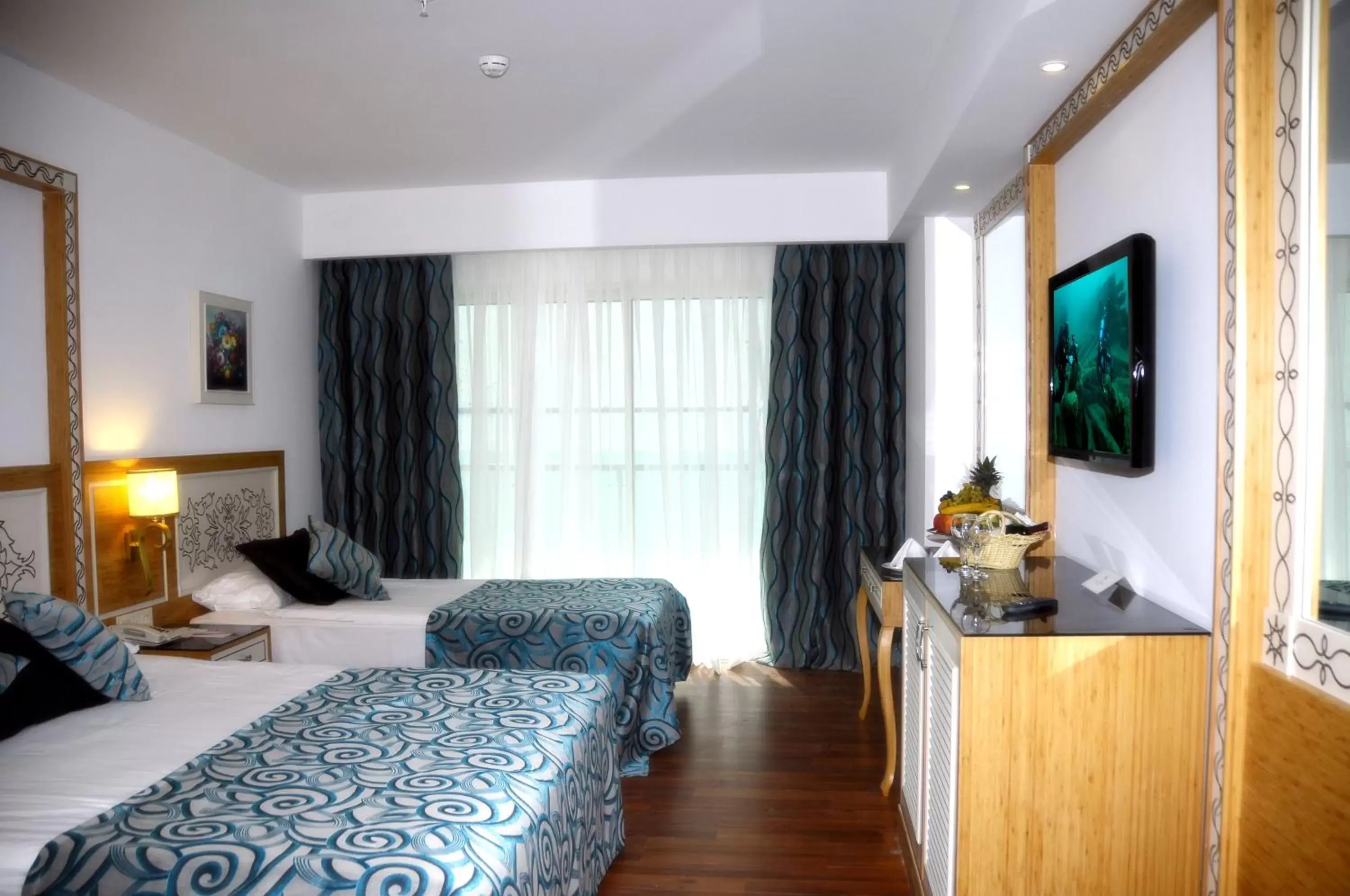 Double or Twin Room with Side Sea View in Crystal Waterworld Resort & Spa - Ultimate All Inclusive