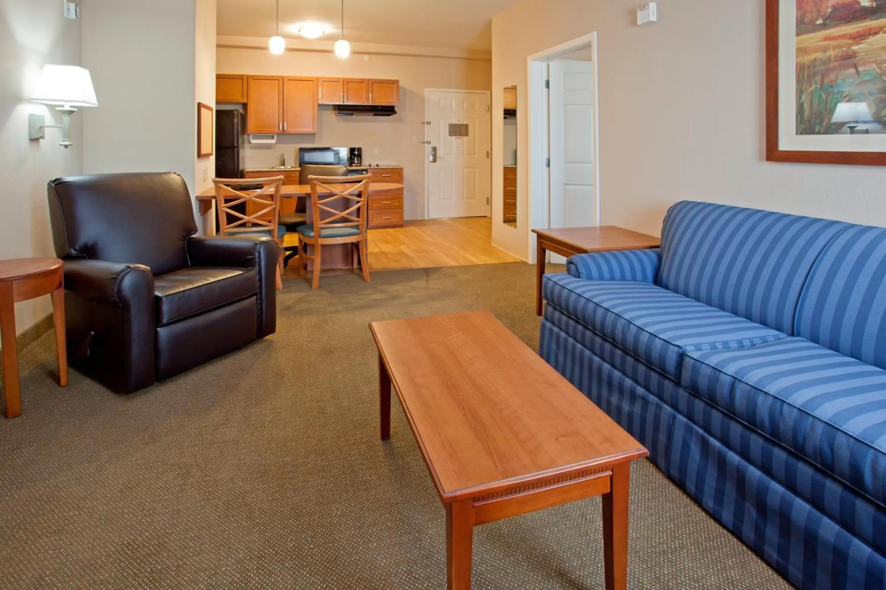 Photo of the whole room, Seating Area in Candlewood Suites League City, an IHG Hotel