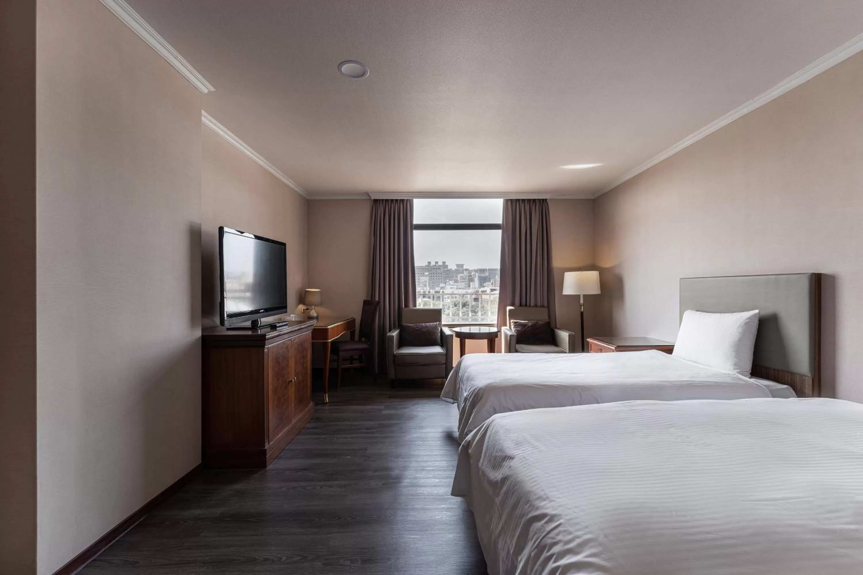 Bed in Hotel j-Metropolis