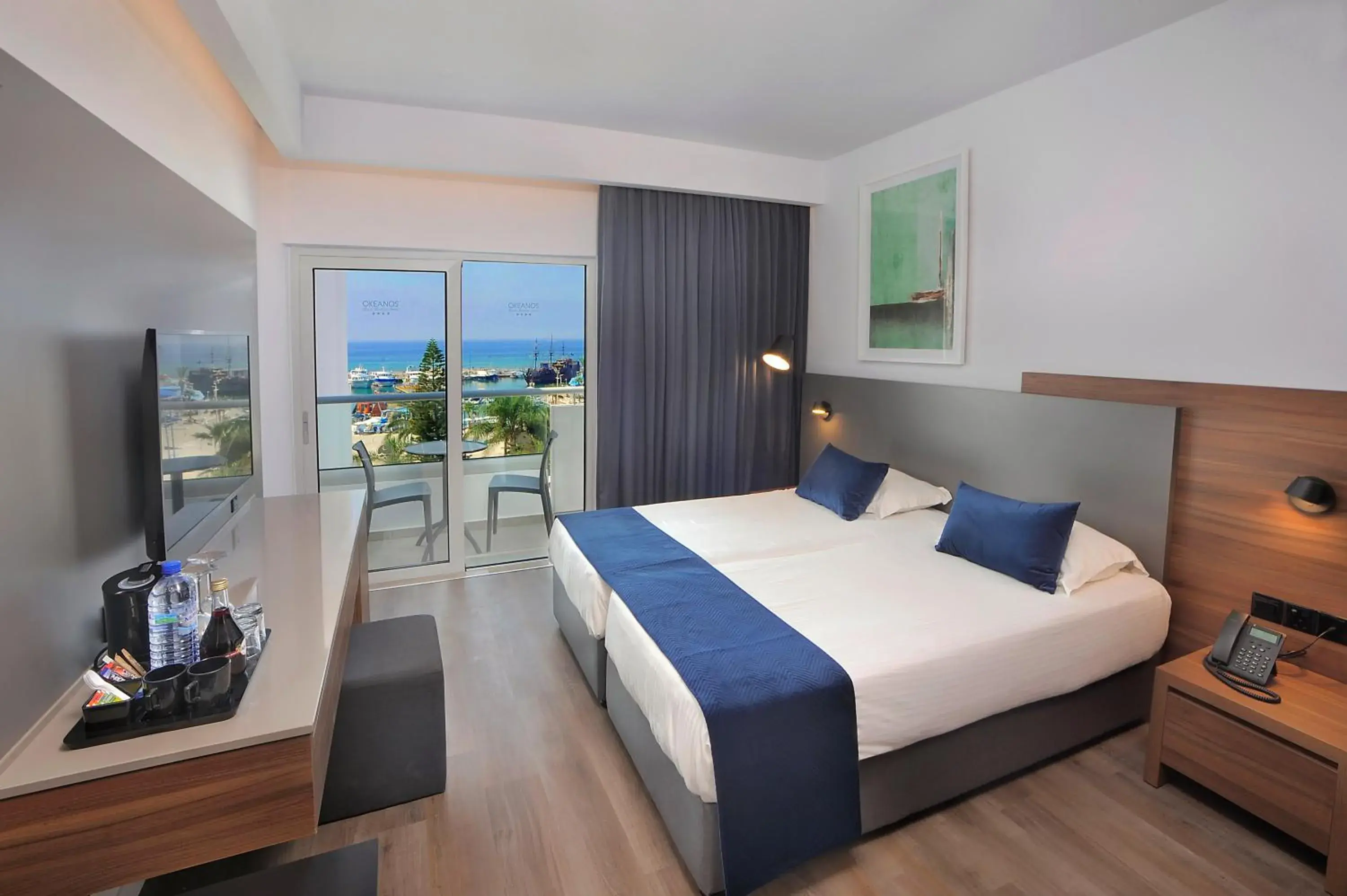 Bed in Okeanos Beach Boutique Hotel