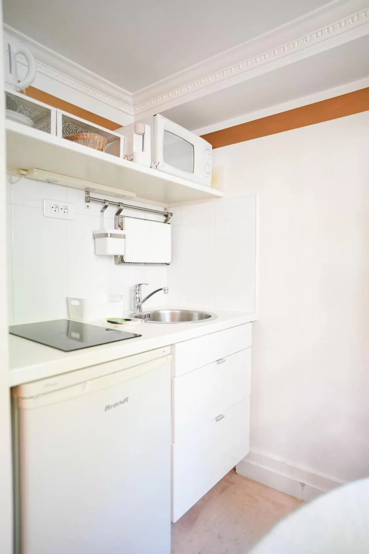 Kitchen or kitchenette in Villa Escudier Appart-hôtel