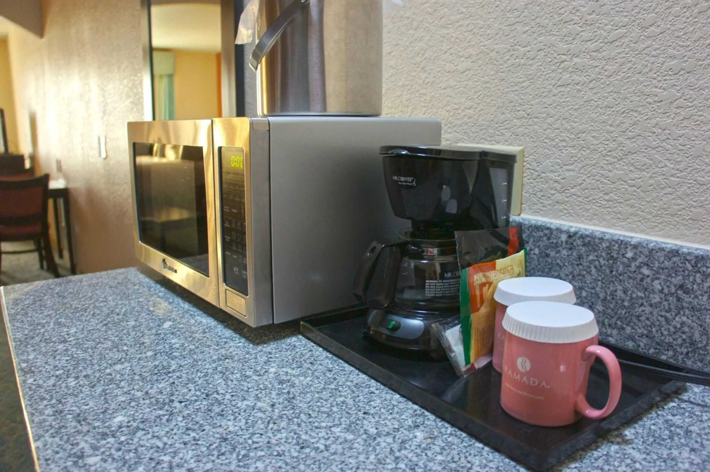 Kitchen or kitchenette, Coffee/Tea Facilities in Ramada by Wyndham South Waco