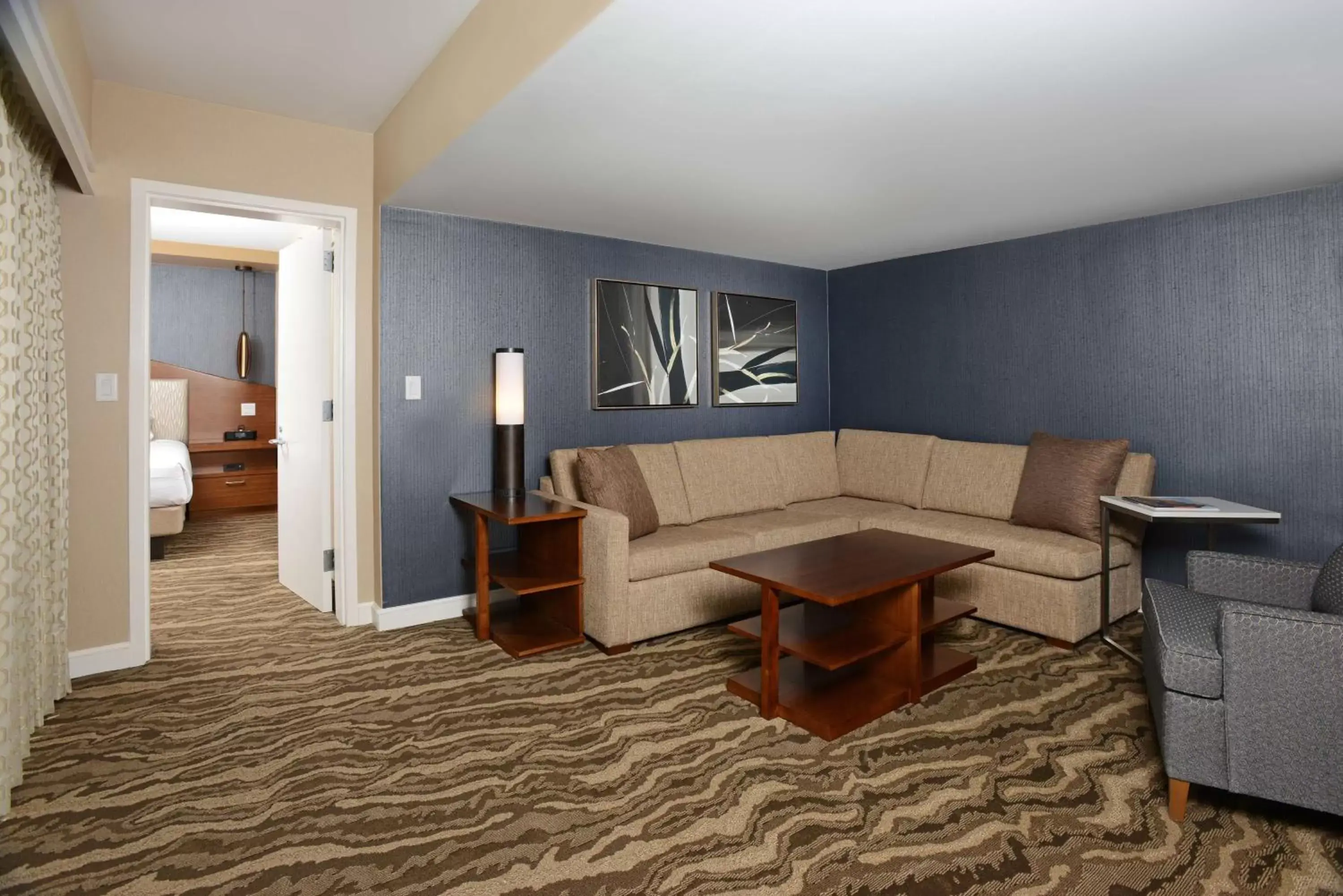 Living room, Seating Area in The Inverness Denver, a Hilton Golf & Spa Resort