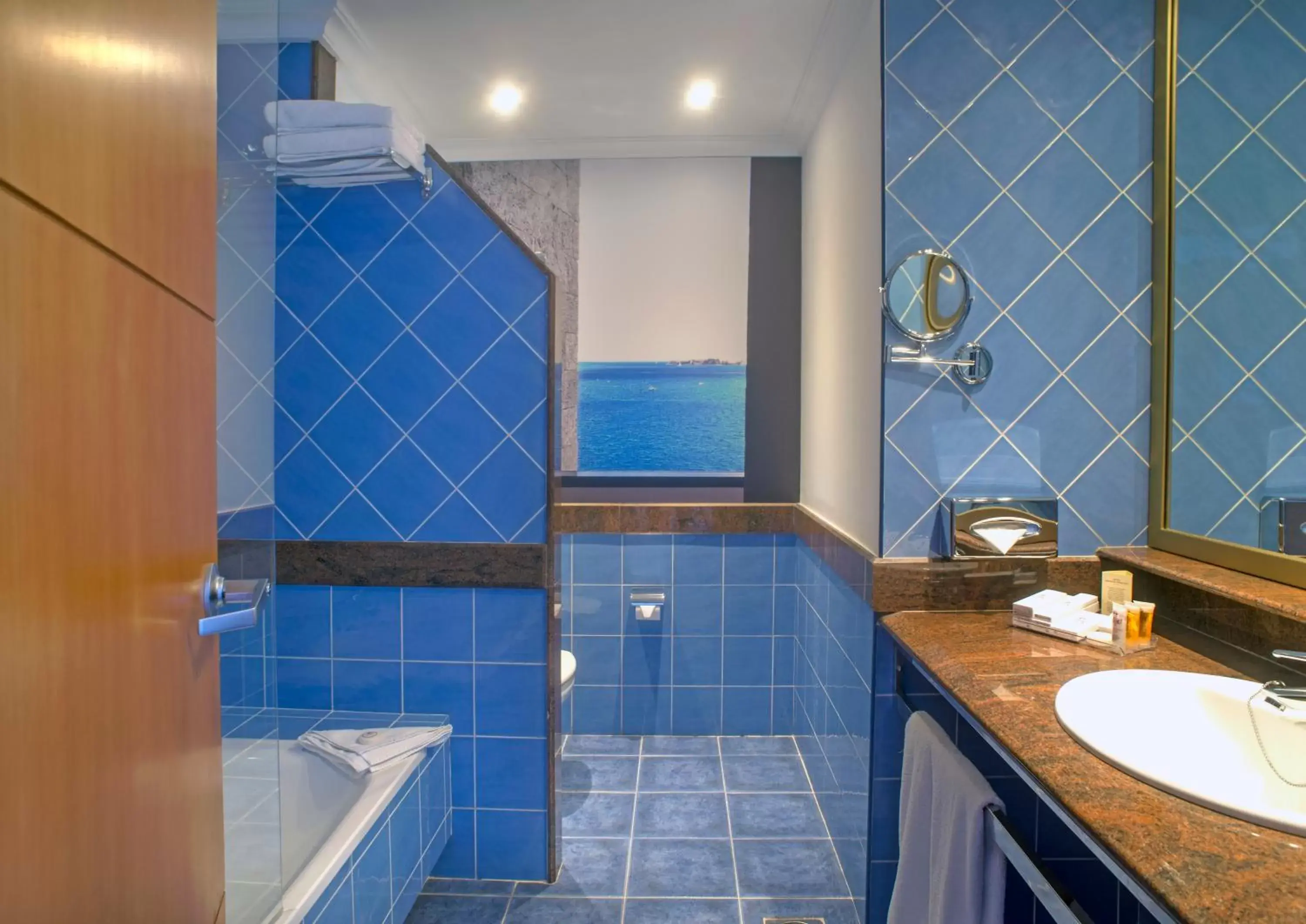 Bathroom in Hotel Mirador Papagayo by LIVVO