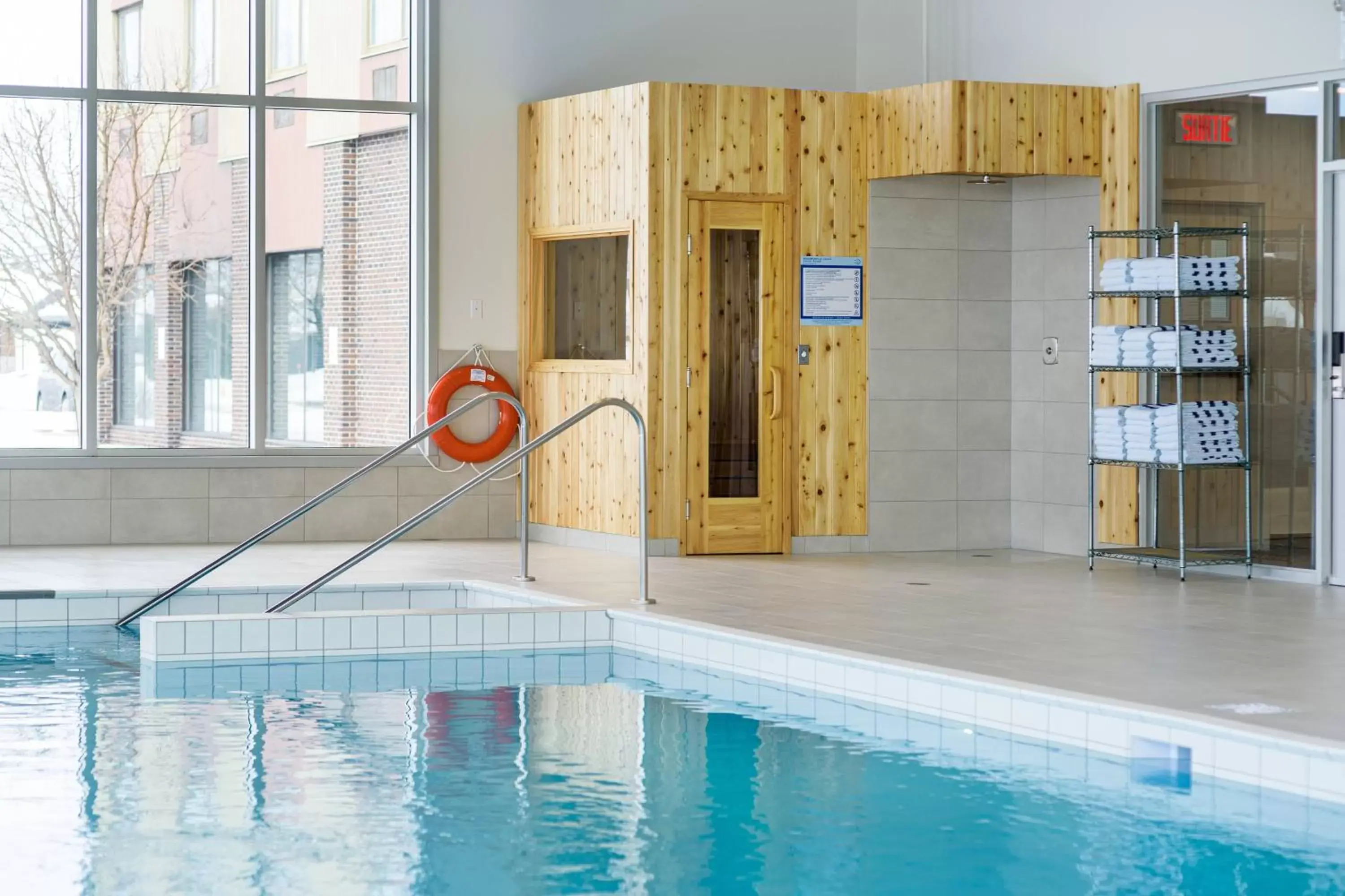 Swimming Pool in Delta Hotels by Marriott Saguenay Conference Centre