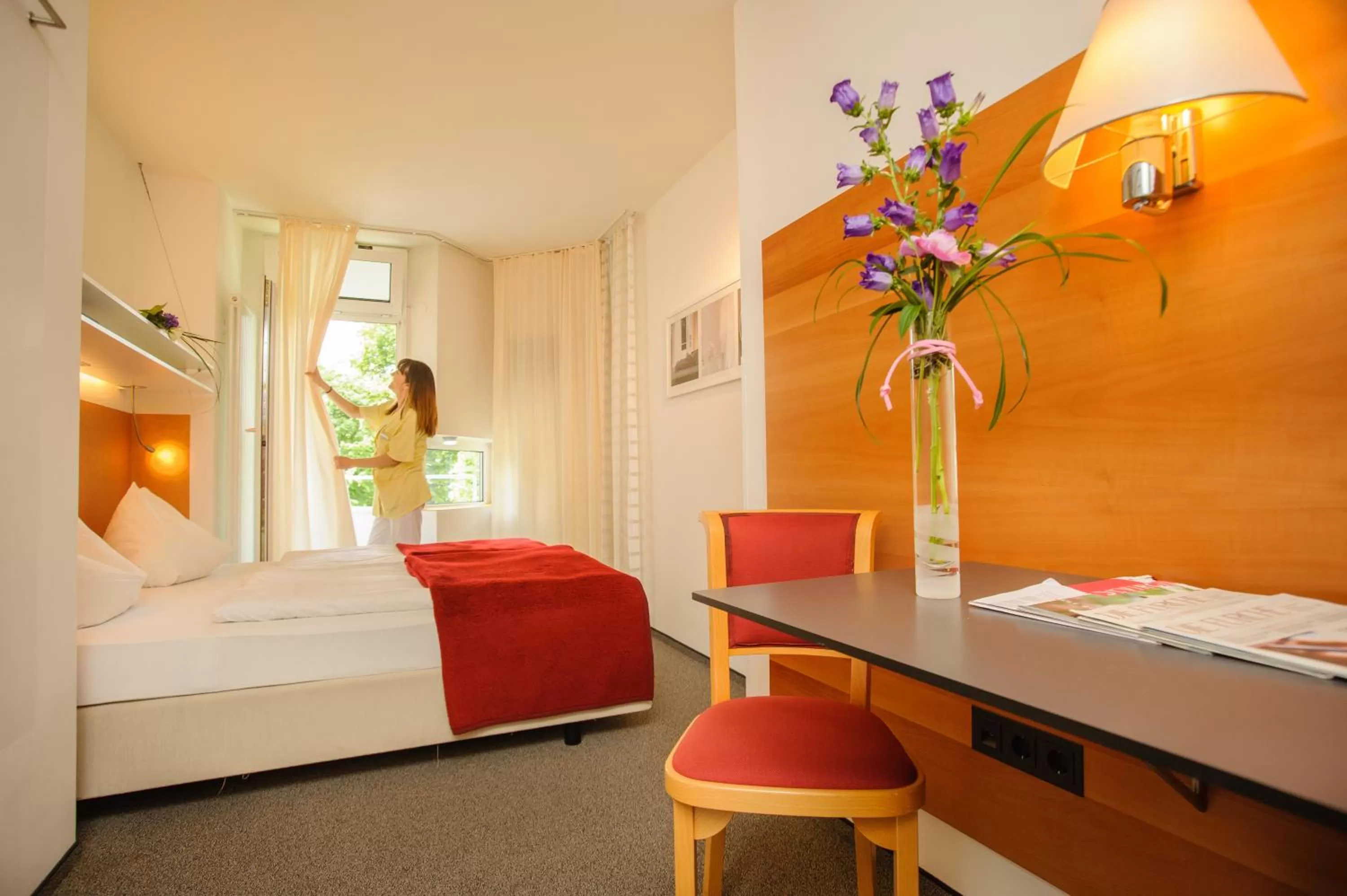 Photo of the whole room, Bed in Hotel St. Virgil Salzburg