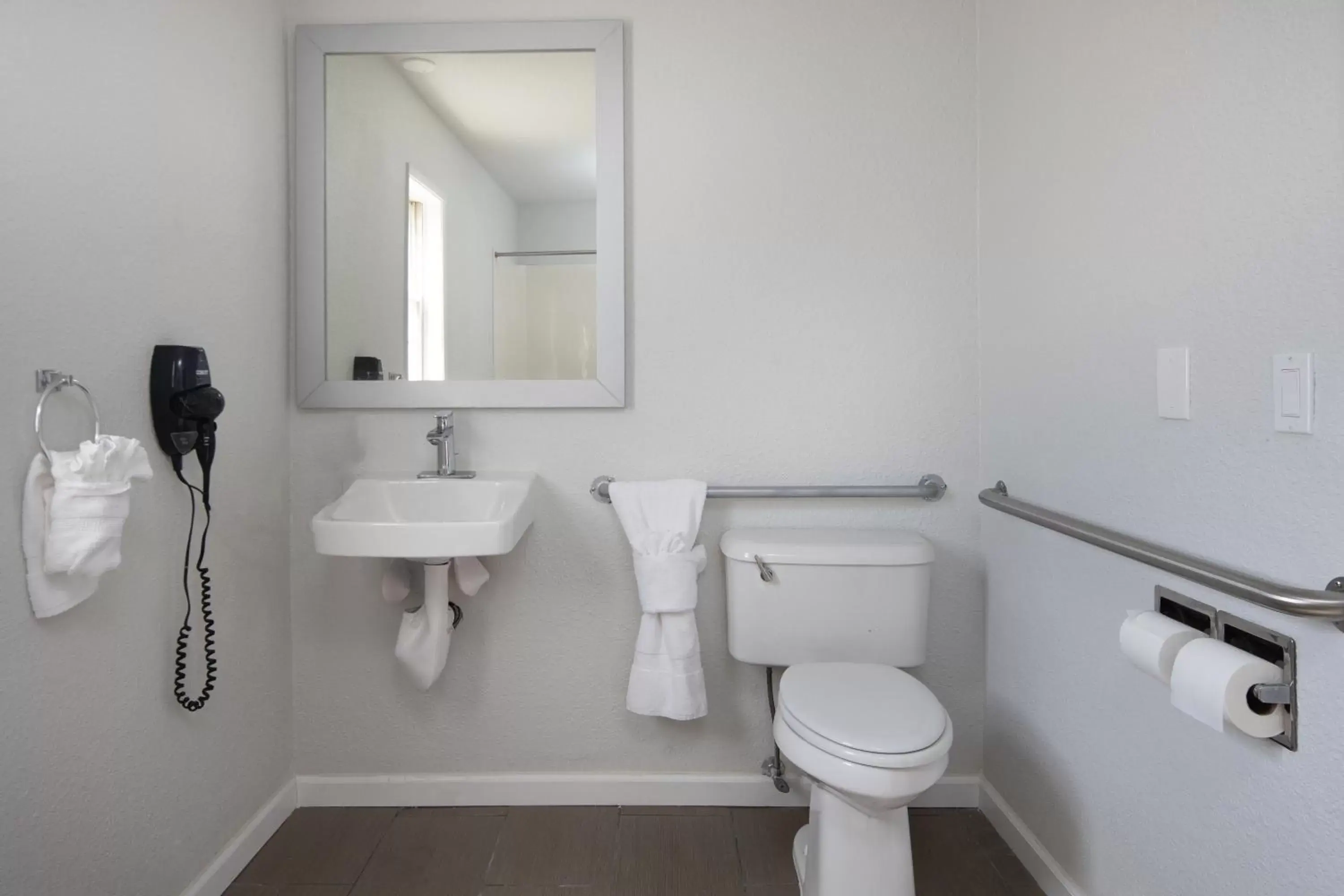 Toilet, Bathroom in Rodeway Inn