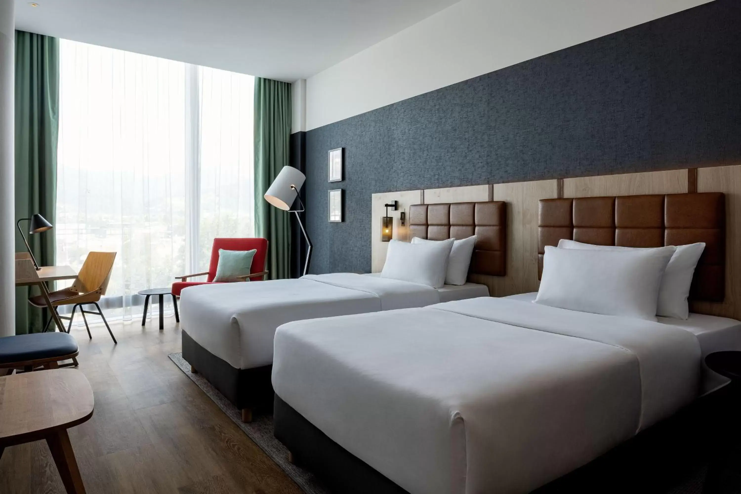 Photo of the whole room, Bed in Four Points by Sheraton Panoramahaus Dornbirn