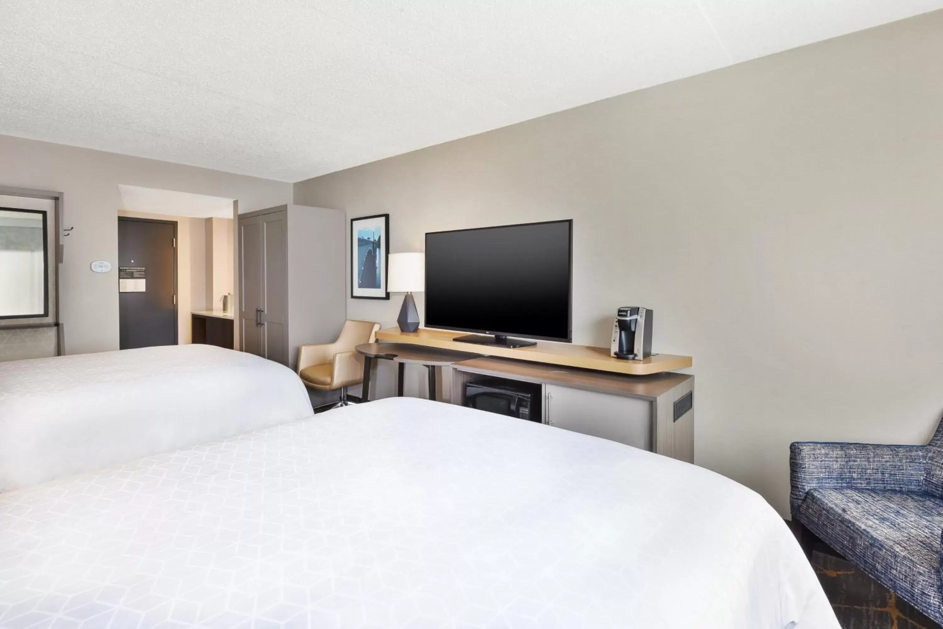 Photo of the whole room, TV/Entertainment Center in Holiday Inn Grand Rapids Downtown, an IHG Hotel