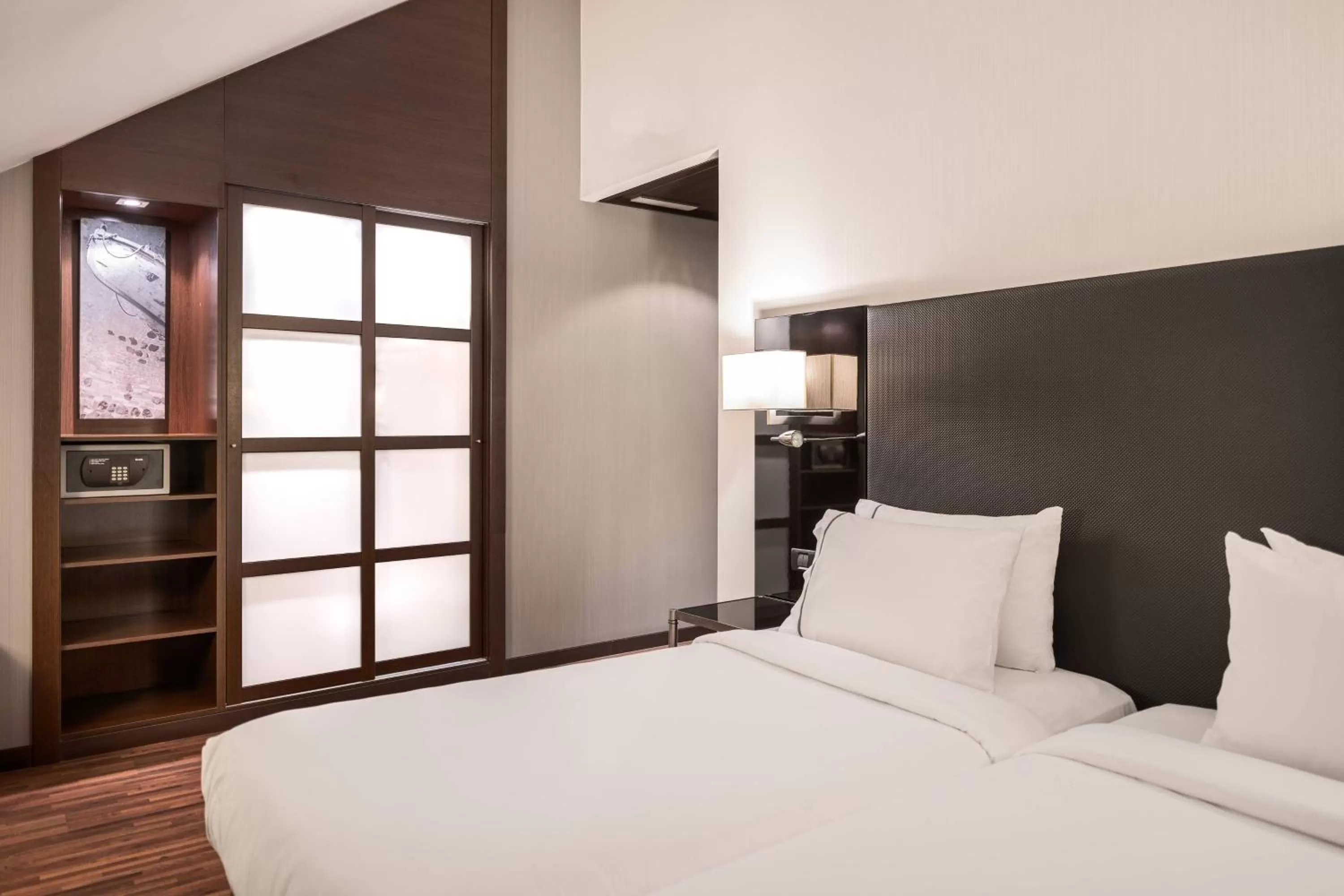 Photo of the whole room, Bed in AC Hotel Palacio Universal by Marriott