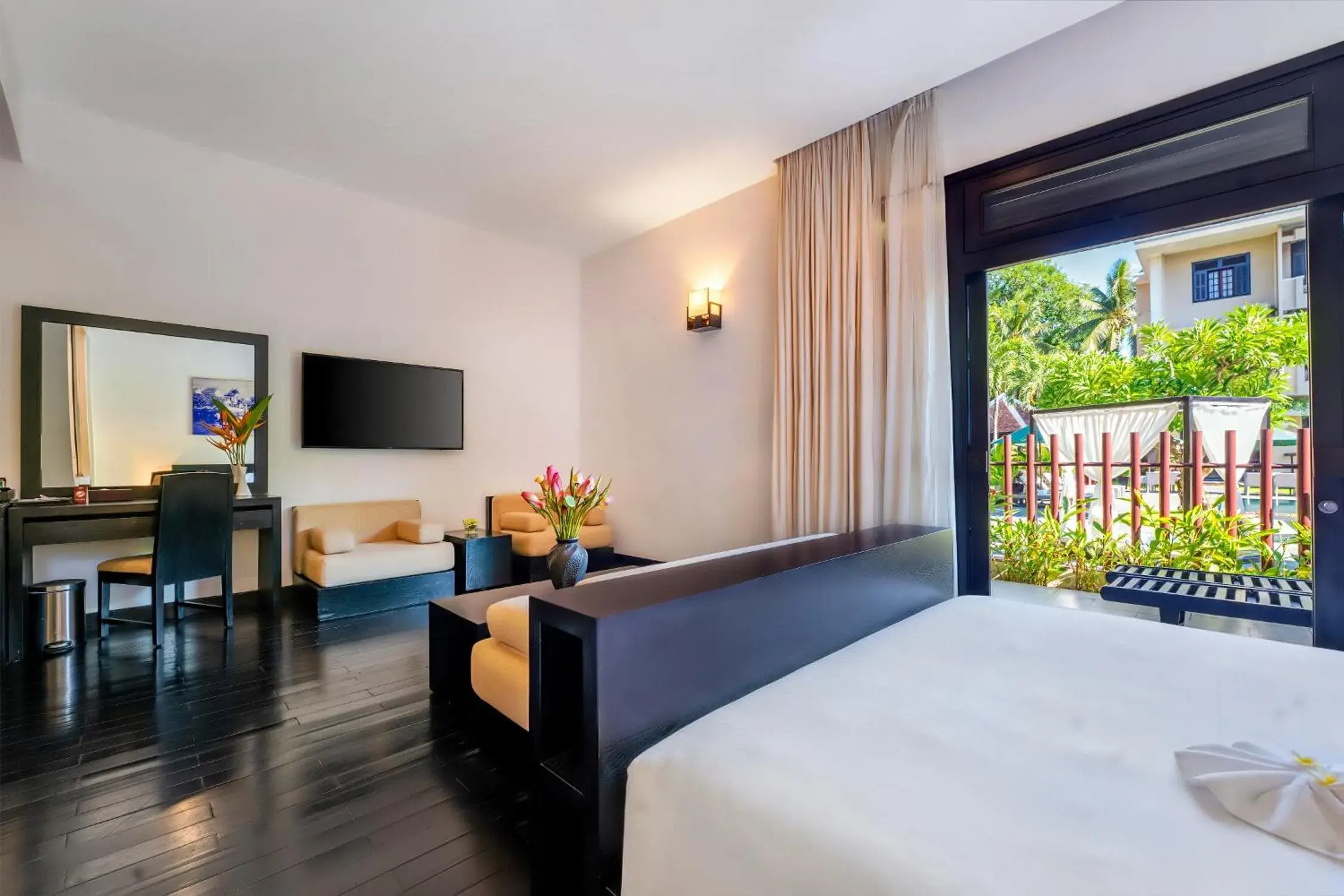Bedroom, TV/Entertainment Center in HOI AN HISTORIC HOTEL