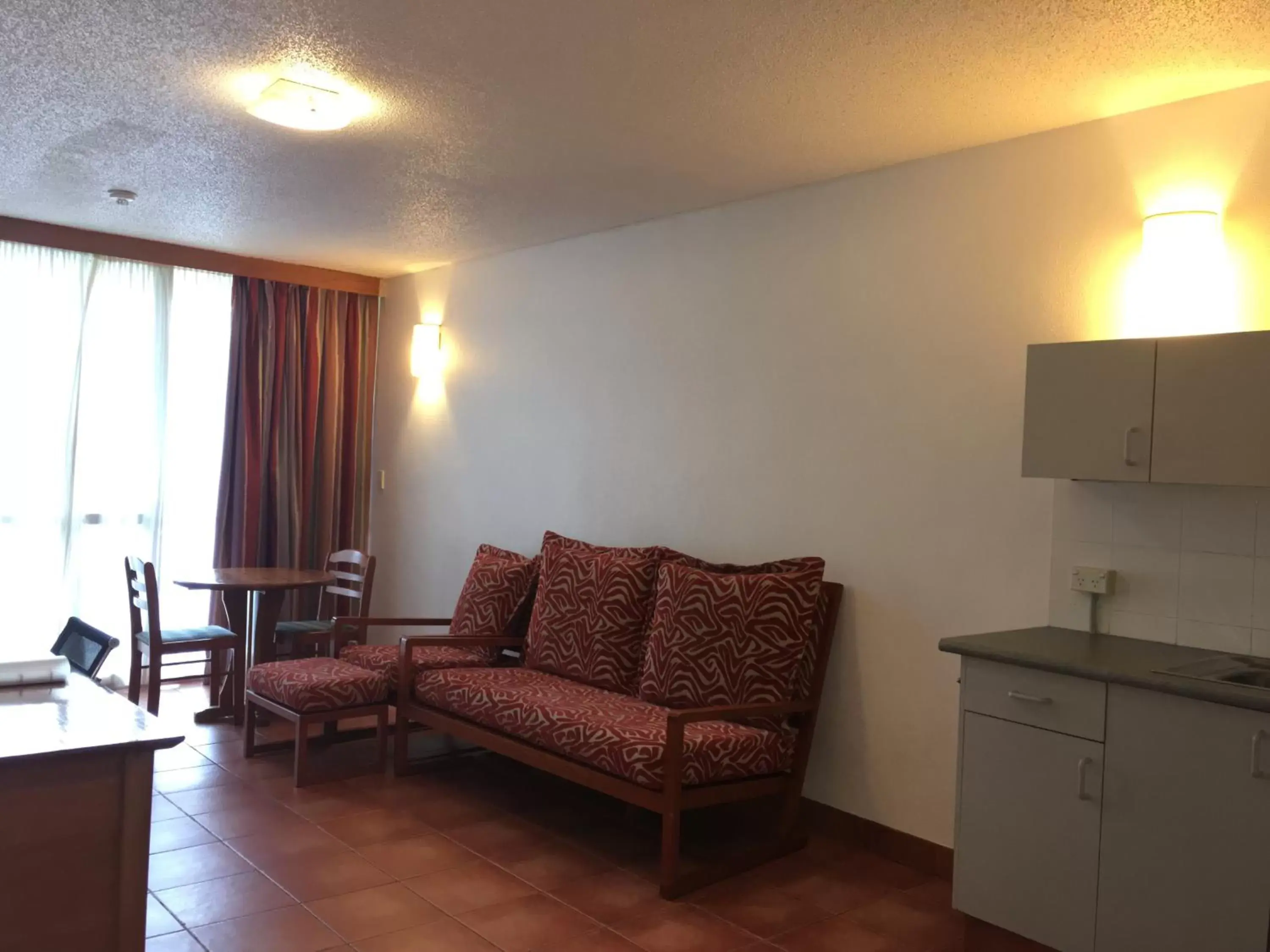 Living room, Seating Area in Holiday Inn & Suites Port Moresby, an IHG Hotel