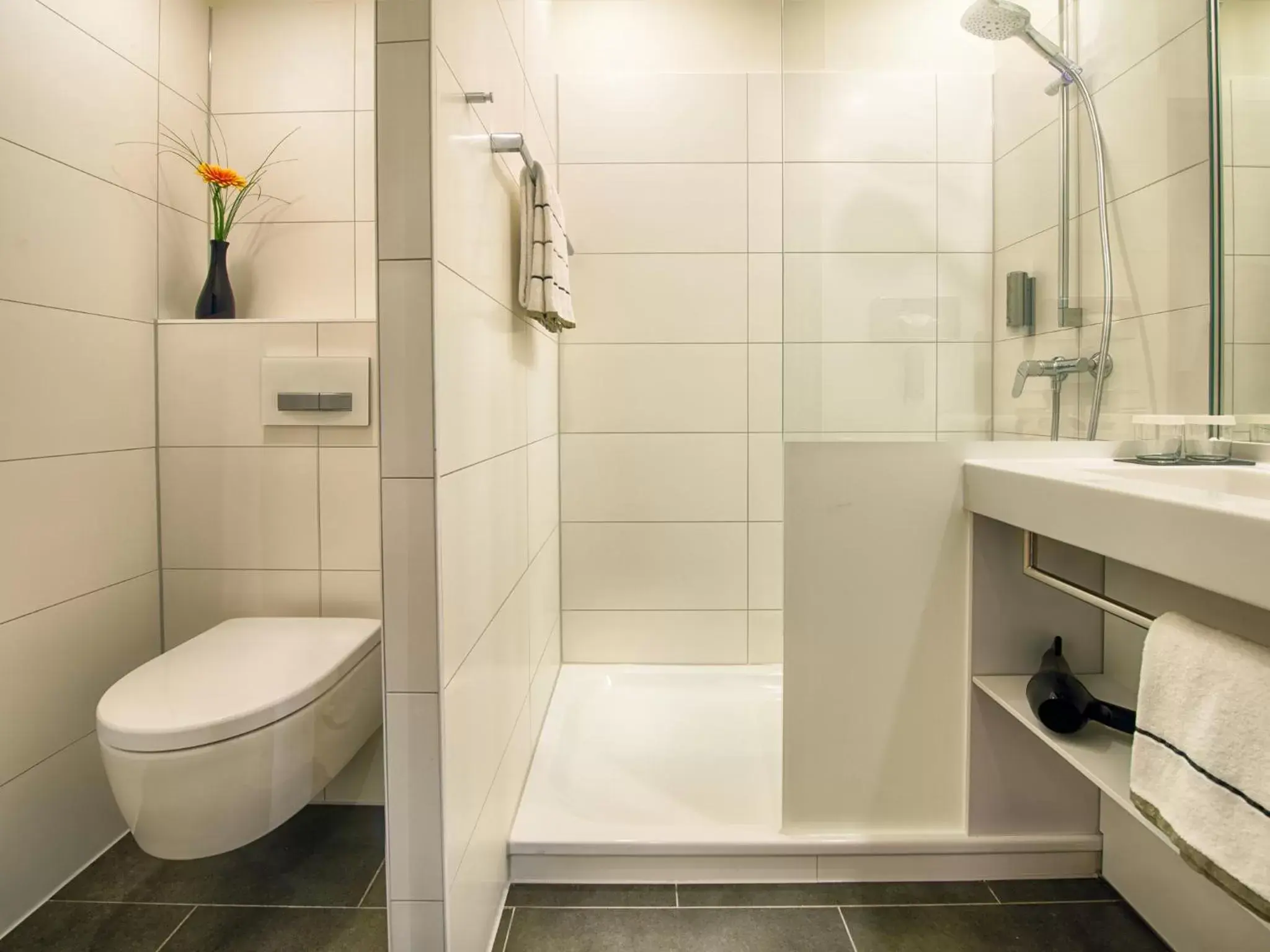 Bathroom in LOGINN Hotel Leipzig by ACHAT