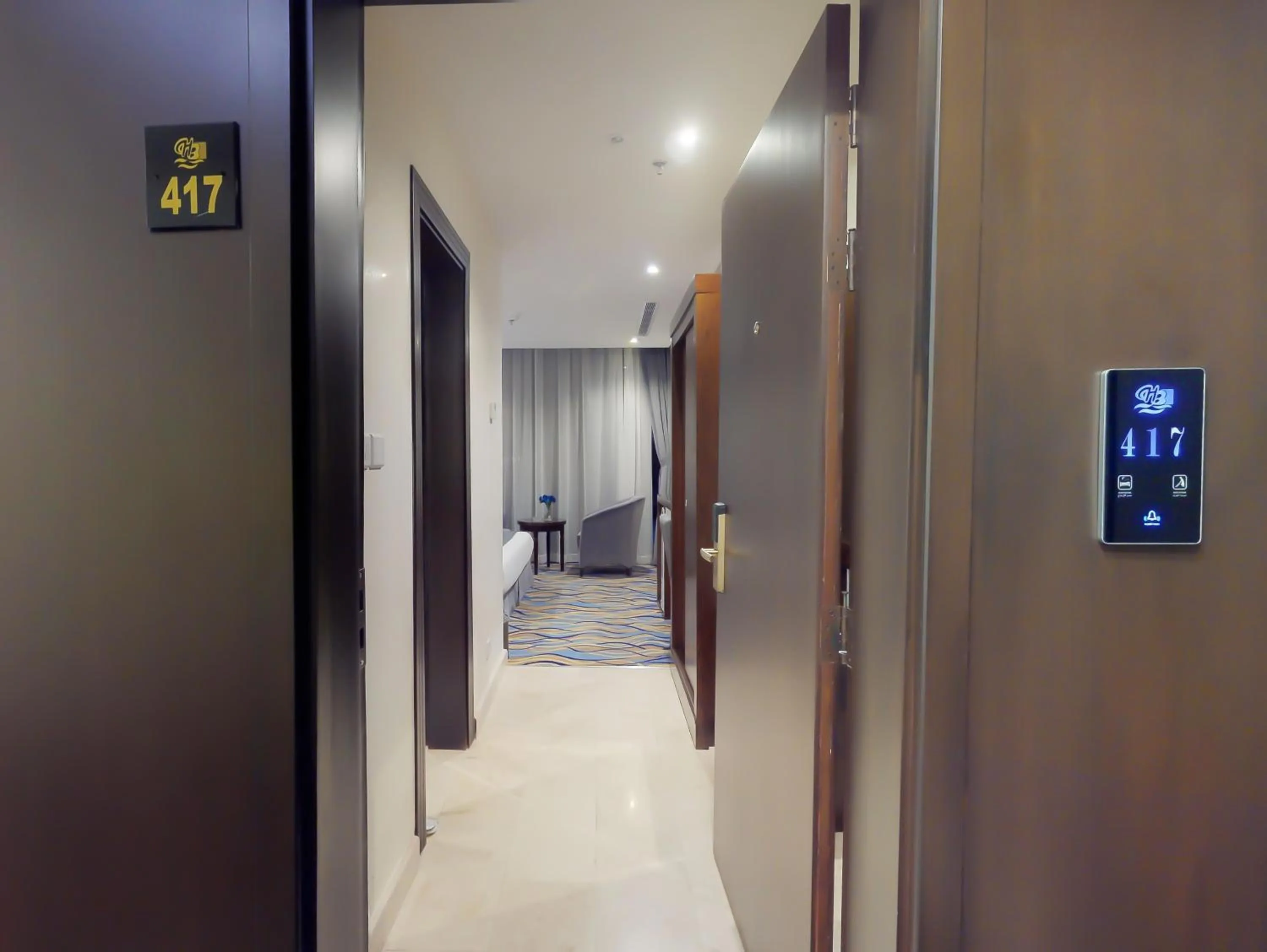 Communal lounge/ TV room in Aster Hotel