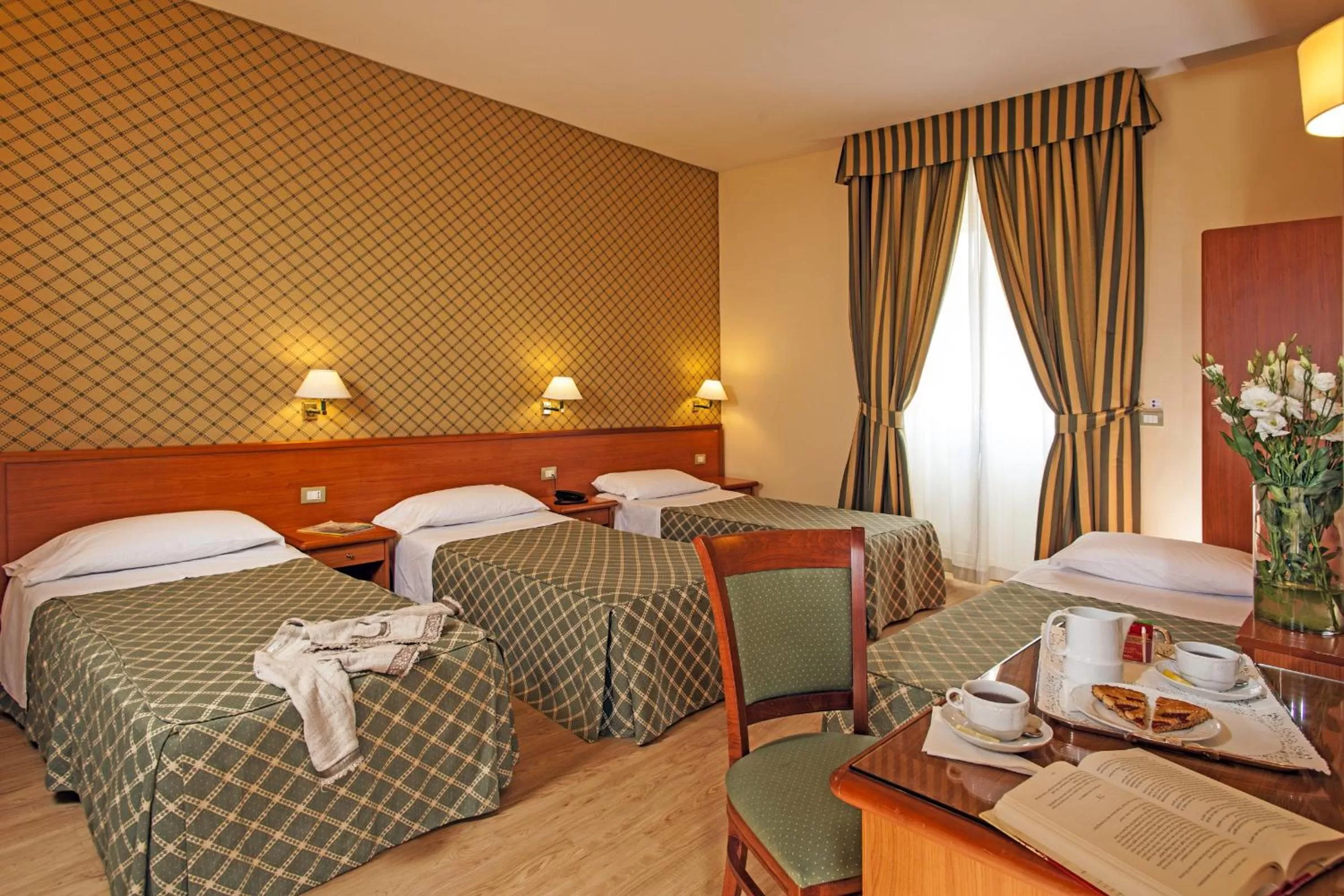 Bed in Hotel Colosseum