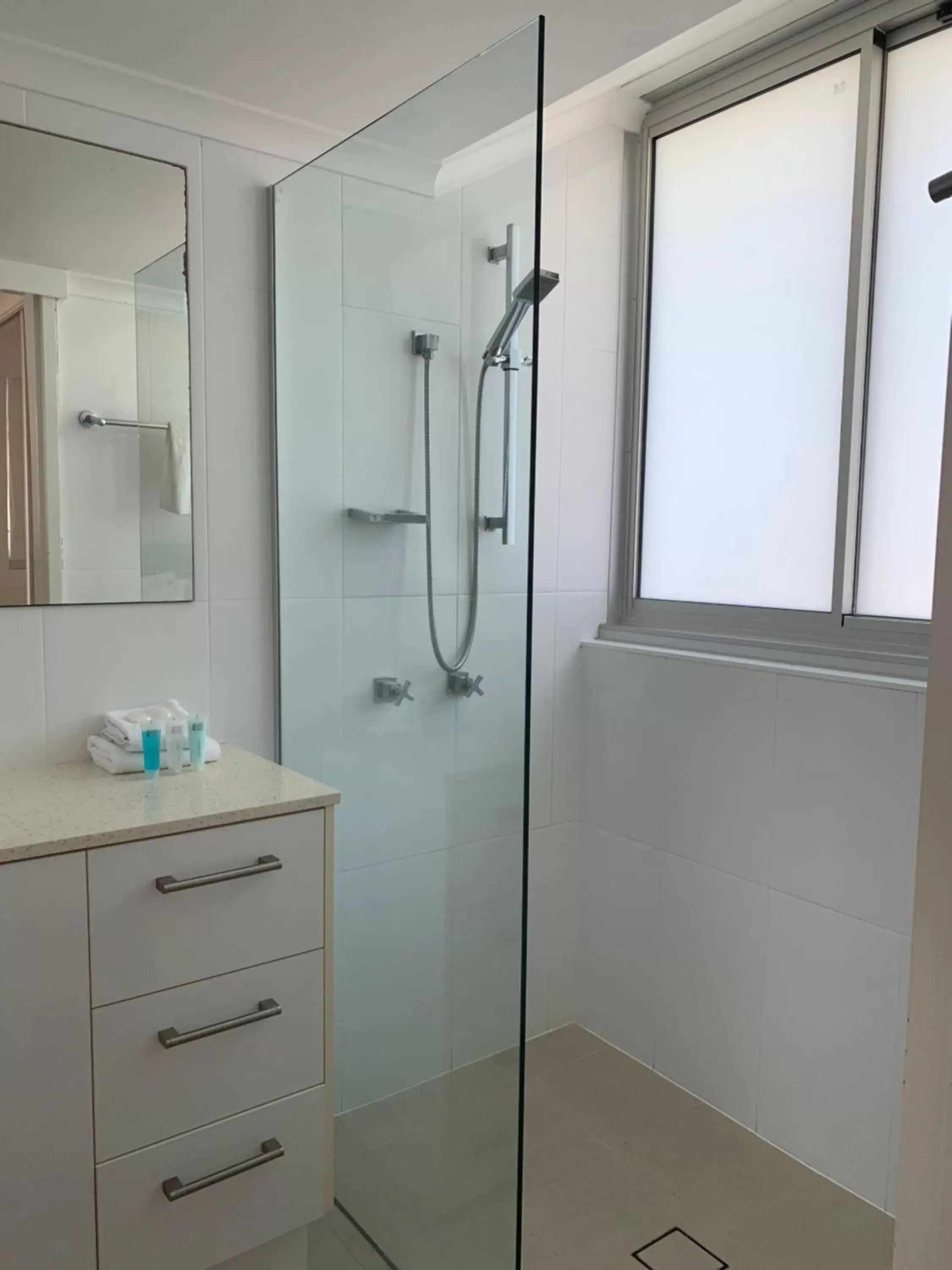 Shower, Bathroom in Pacific Regis Beachfront Holiday Apartments