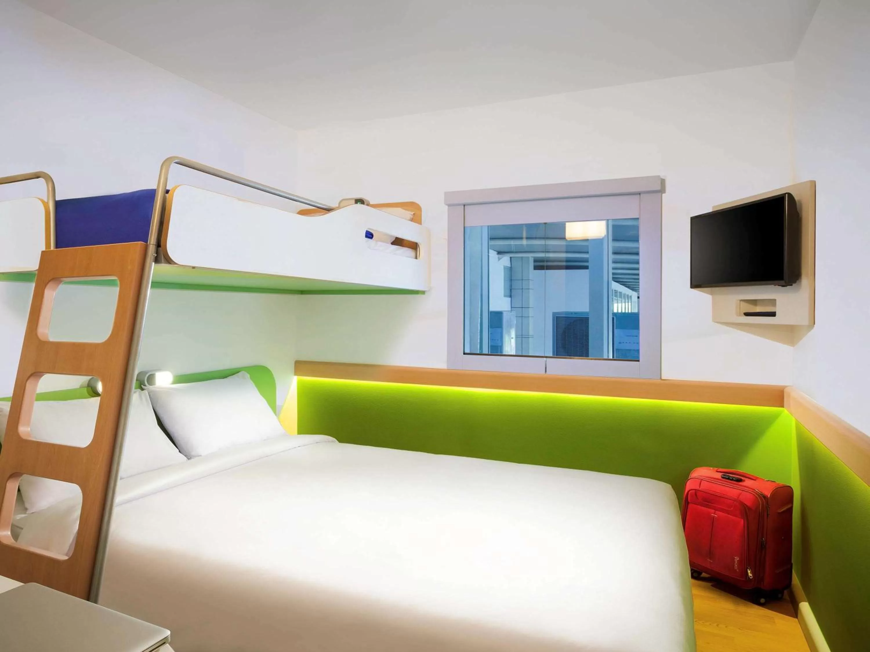 Photo of the whole room, Bed in Cordia Hotel Makassar Airport