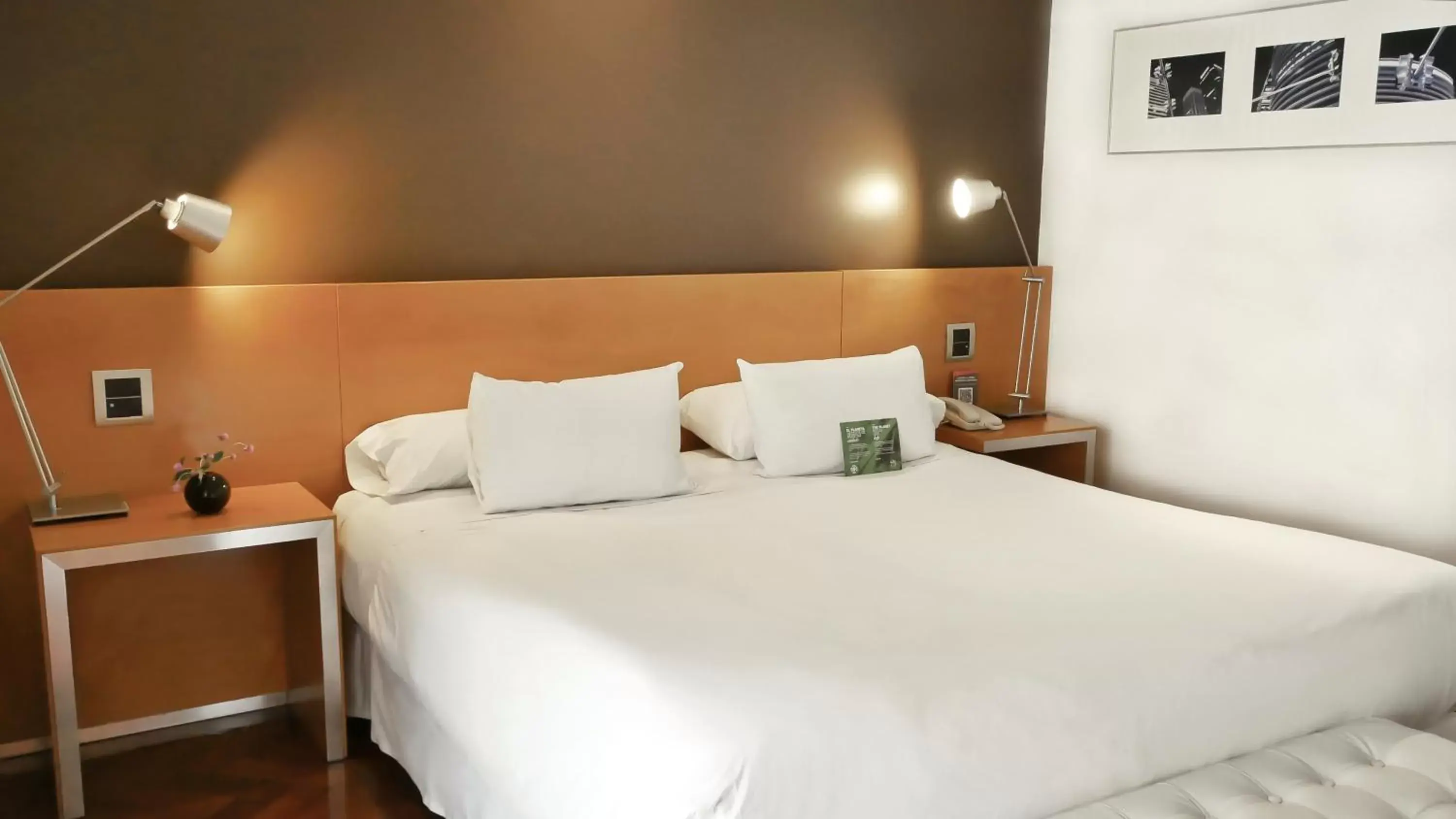 Bed in 725 Continental Hotel Bed in 725 Continental Hotel